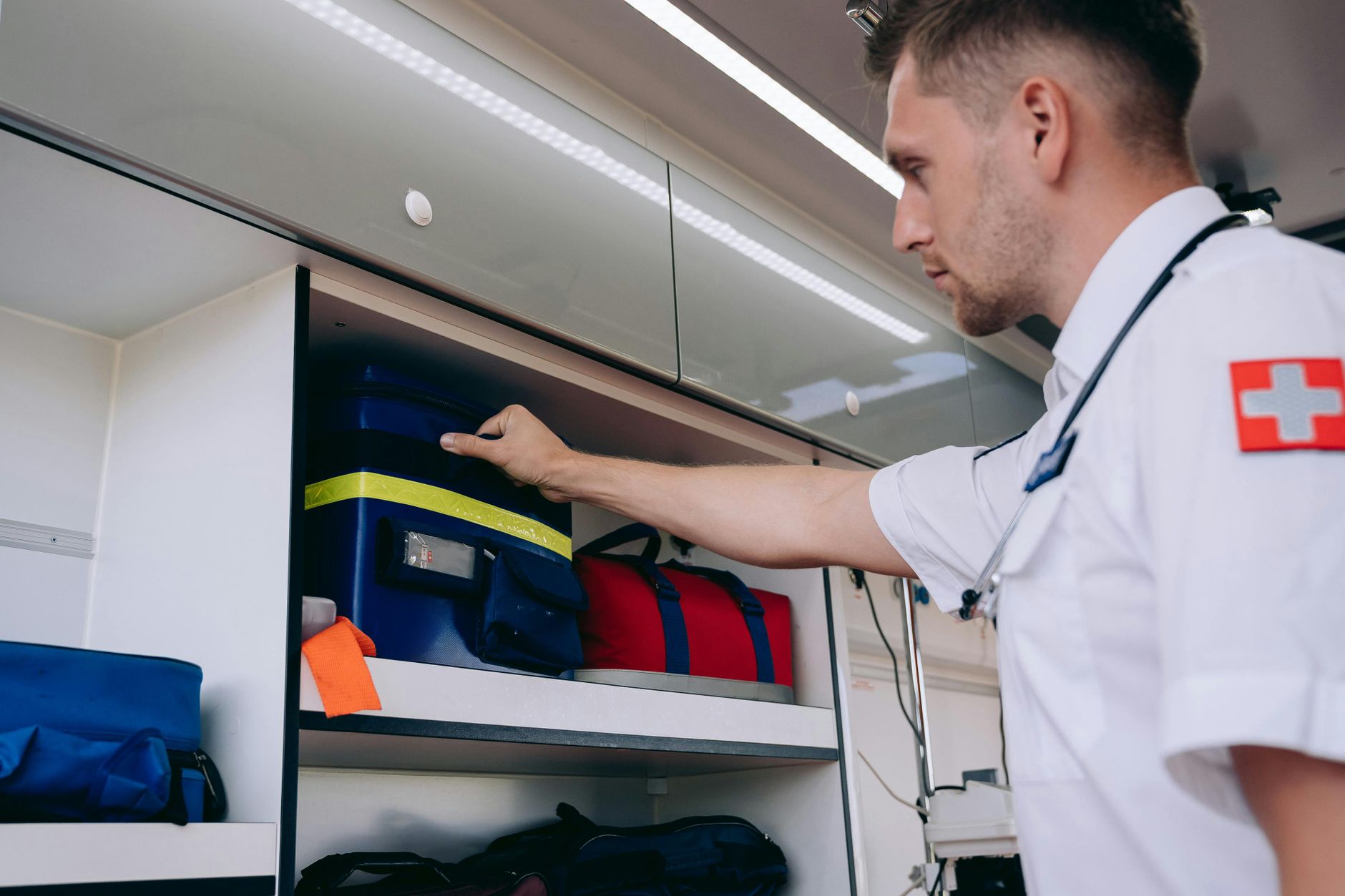 Organized medical supply shelving that represents the kind of repeatable back-of-house route an ASC should test before buying a delivery robot.