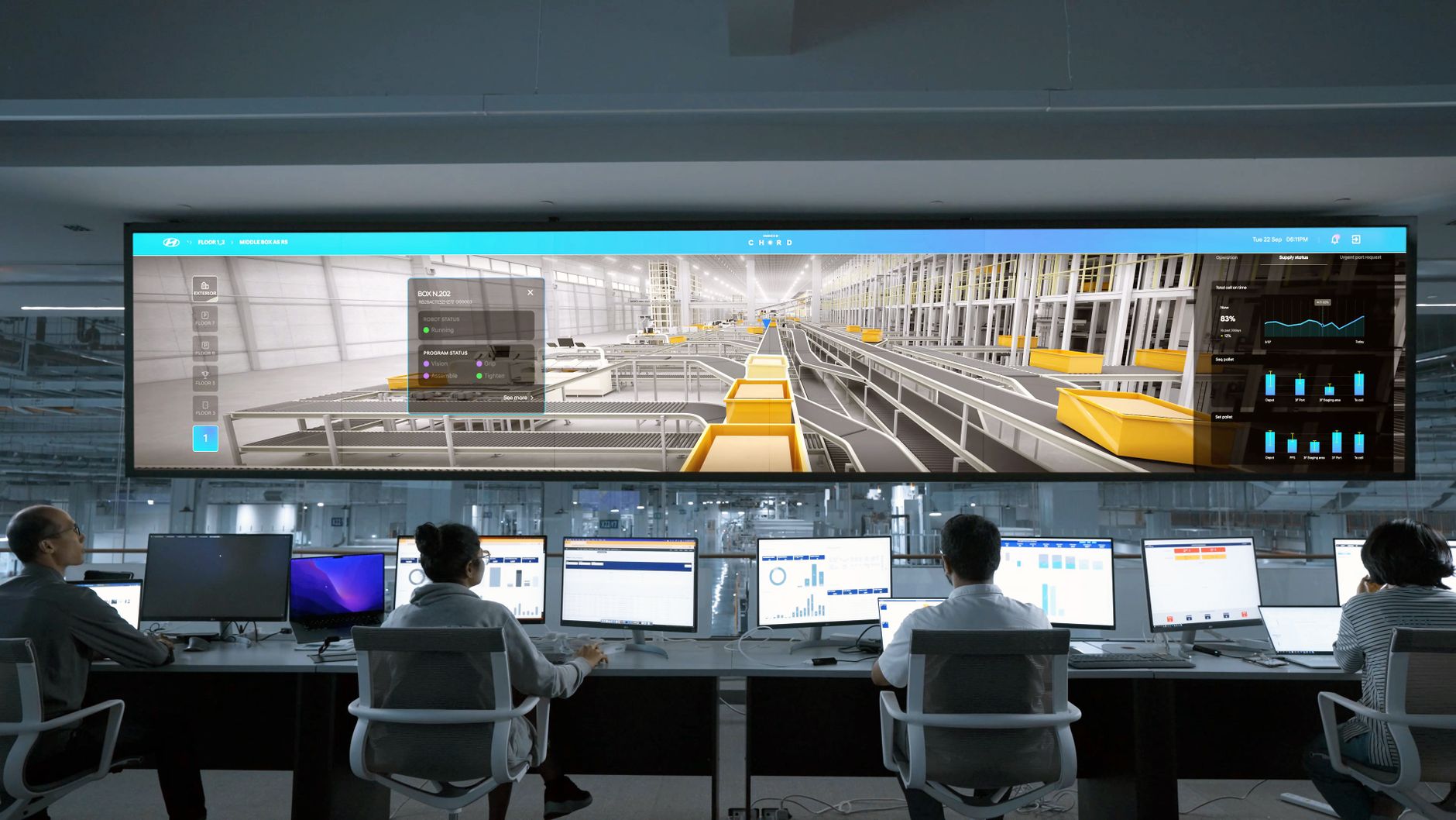 A modern security operations center with multiple monitors displaying camera feeds and data, illustrating the real-time tracking of assets.