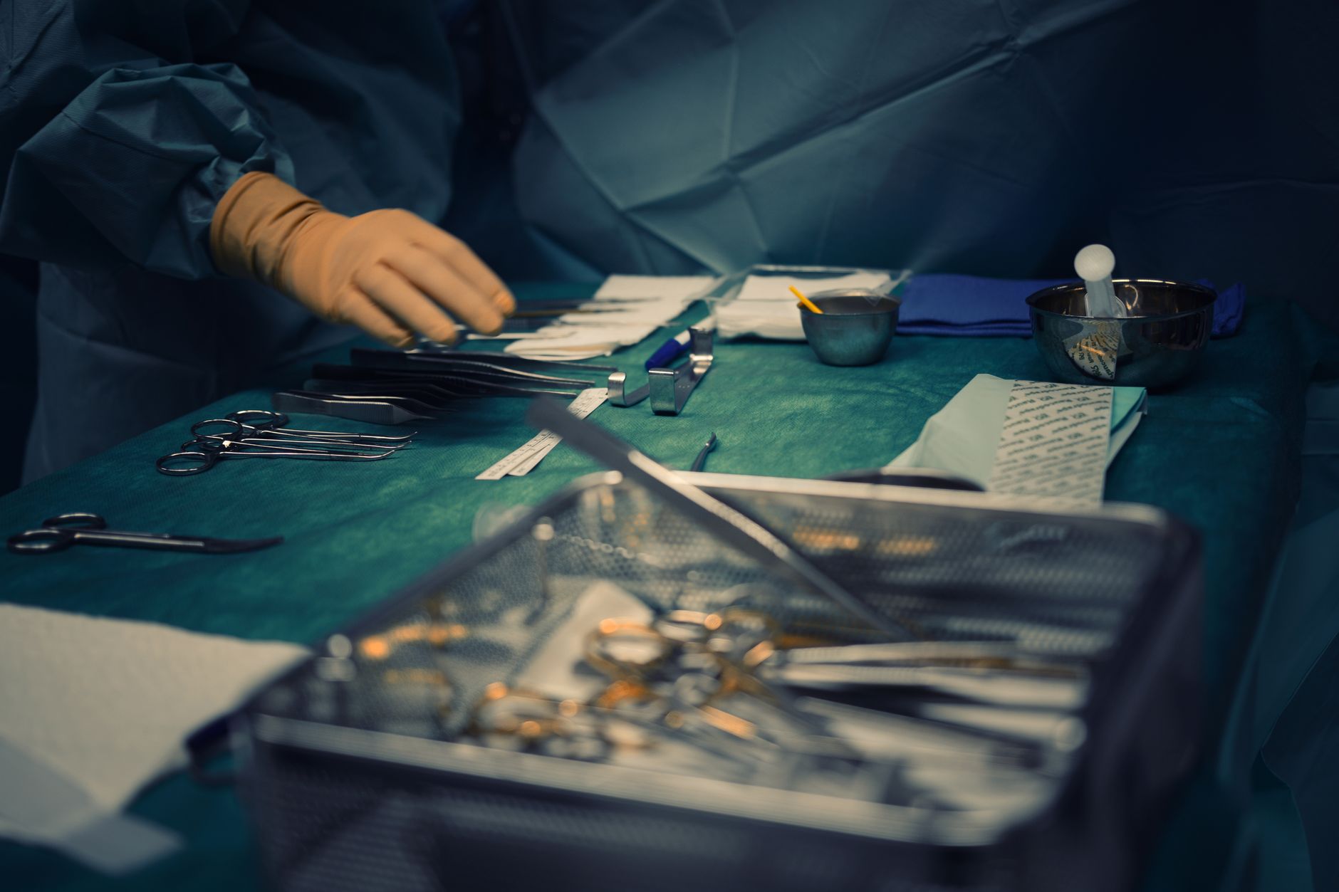Close-up of meticulously arranged and sterilized surgical instruments on a tray, representing a disinfected clinical environment.