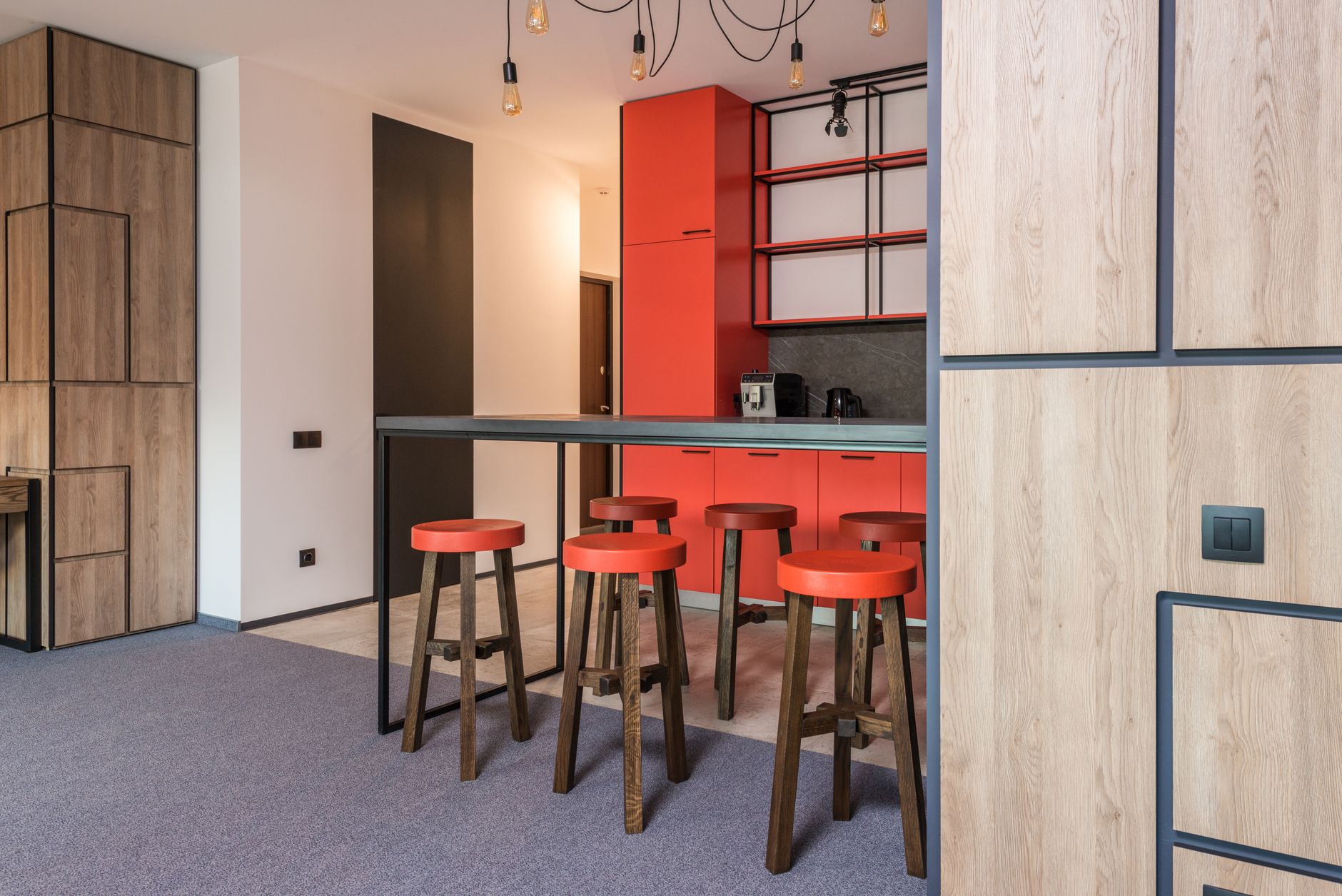 A tidy hotel service pantry or back corridor on a guest floor, representing the kind of controlled staging point used in a narrow tray-return pilot.