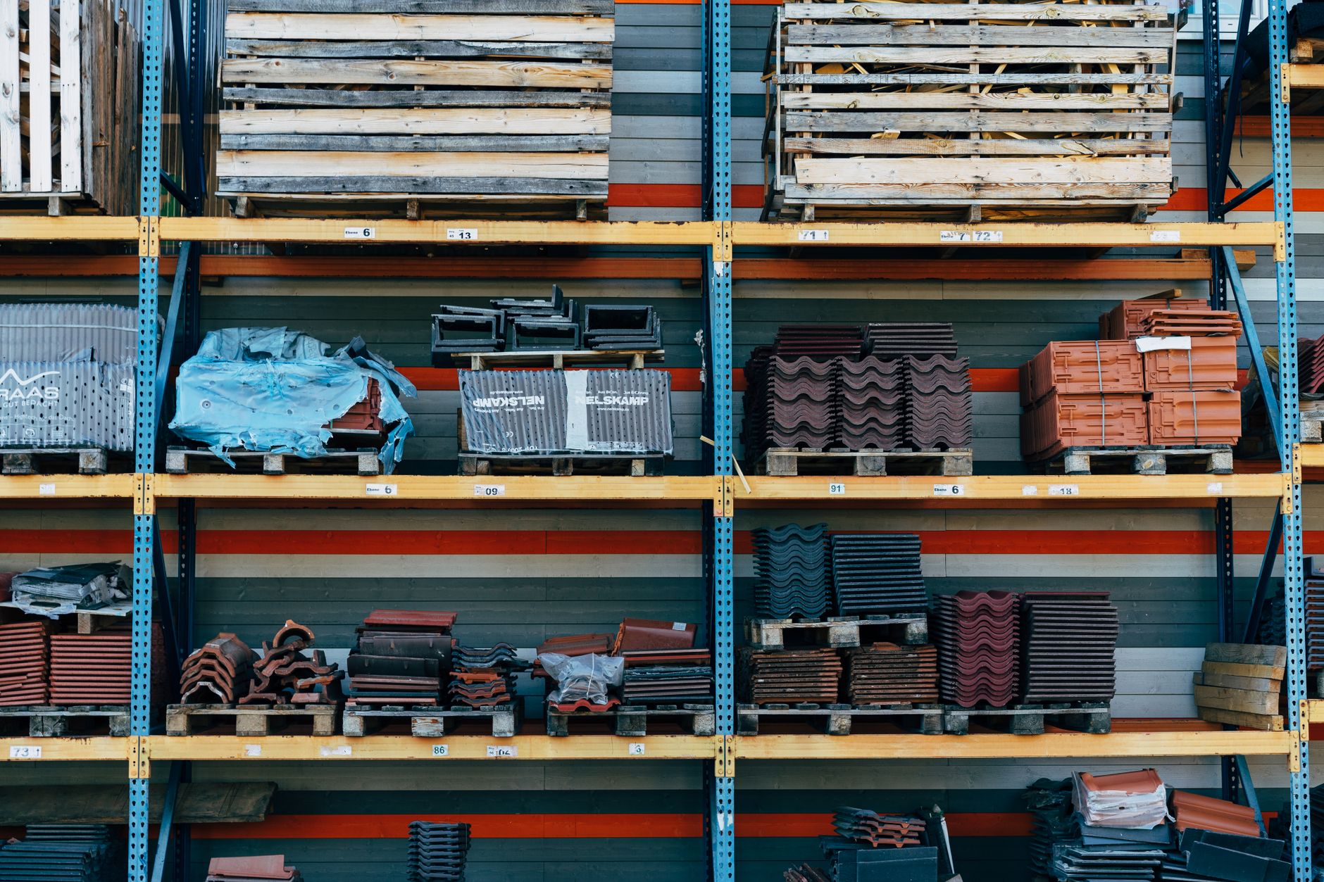 Neatly organized shelves in a retail backroom, showing how proper stock placement aids automated counting systems.