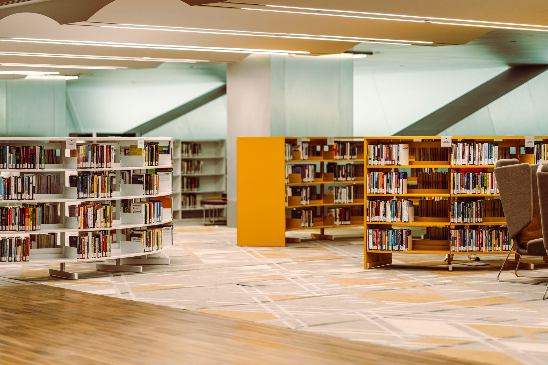 A library circulation desk with returned books waiting to move into the sorting and reshelving workflow.