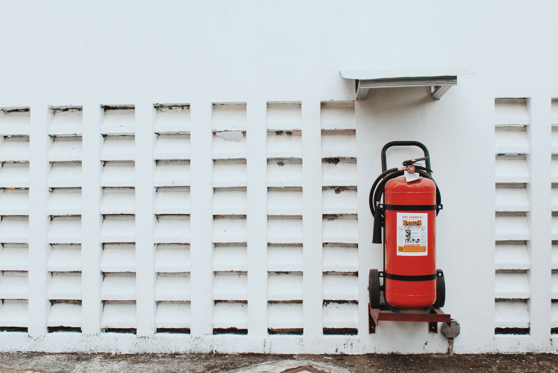 Fire-response equipment stands ready inside an industrial facility handling battery materials.