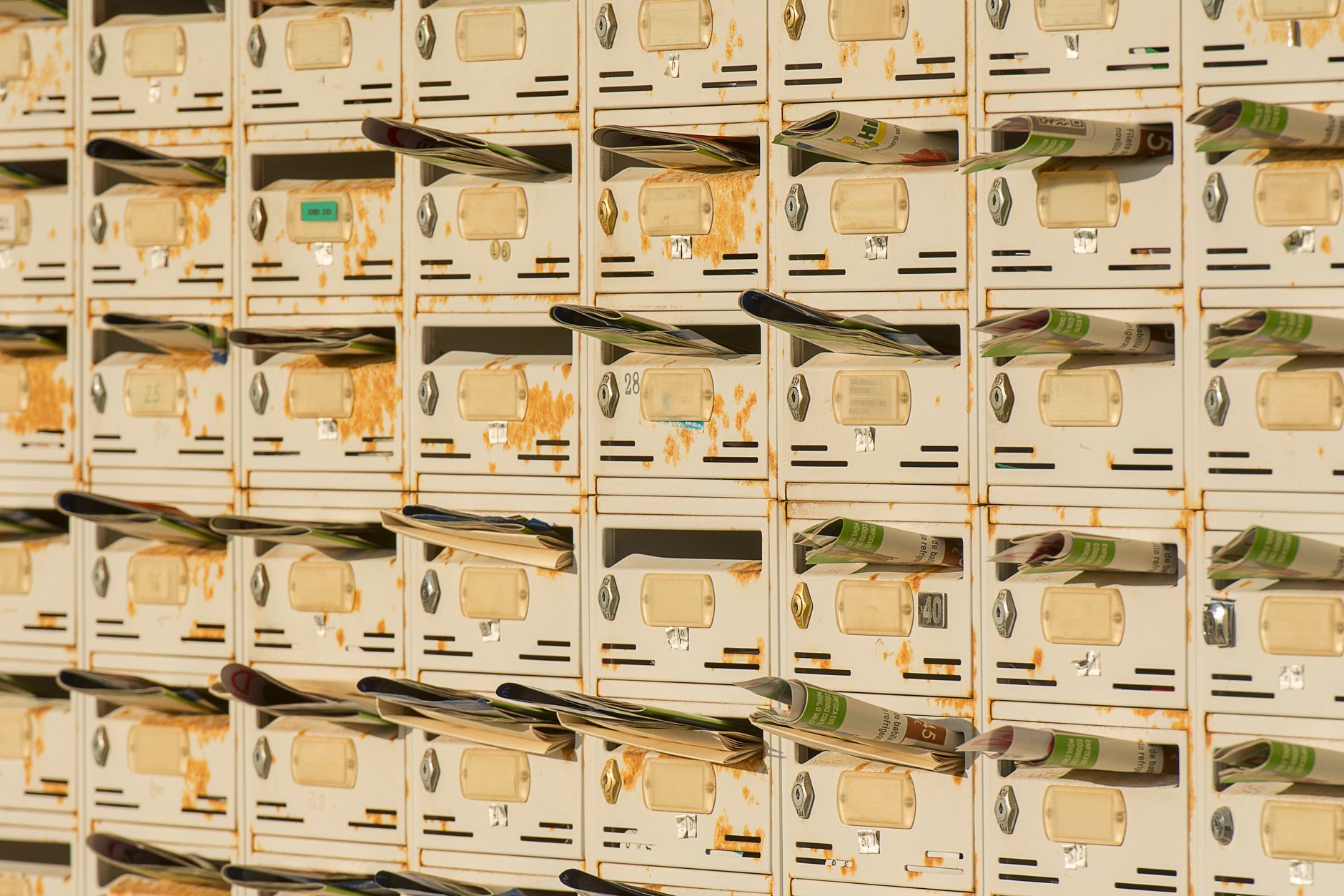 Stacked mail trays ready for transport between production stations.