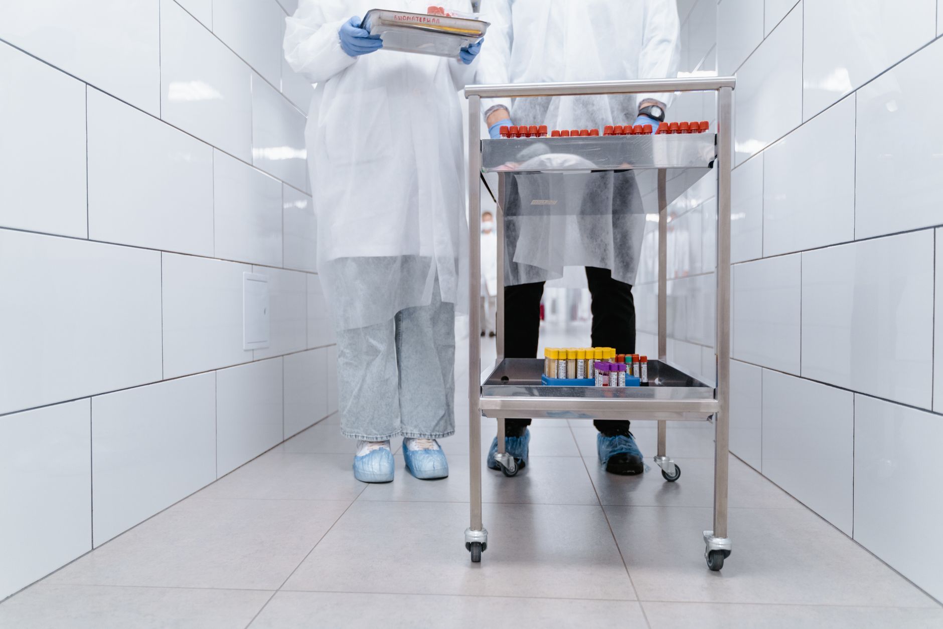 A hospital laboratory corridor connecting work areas involved in pathology slide transport.