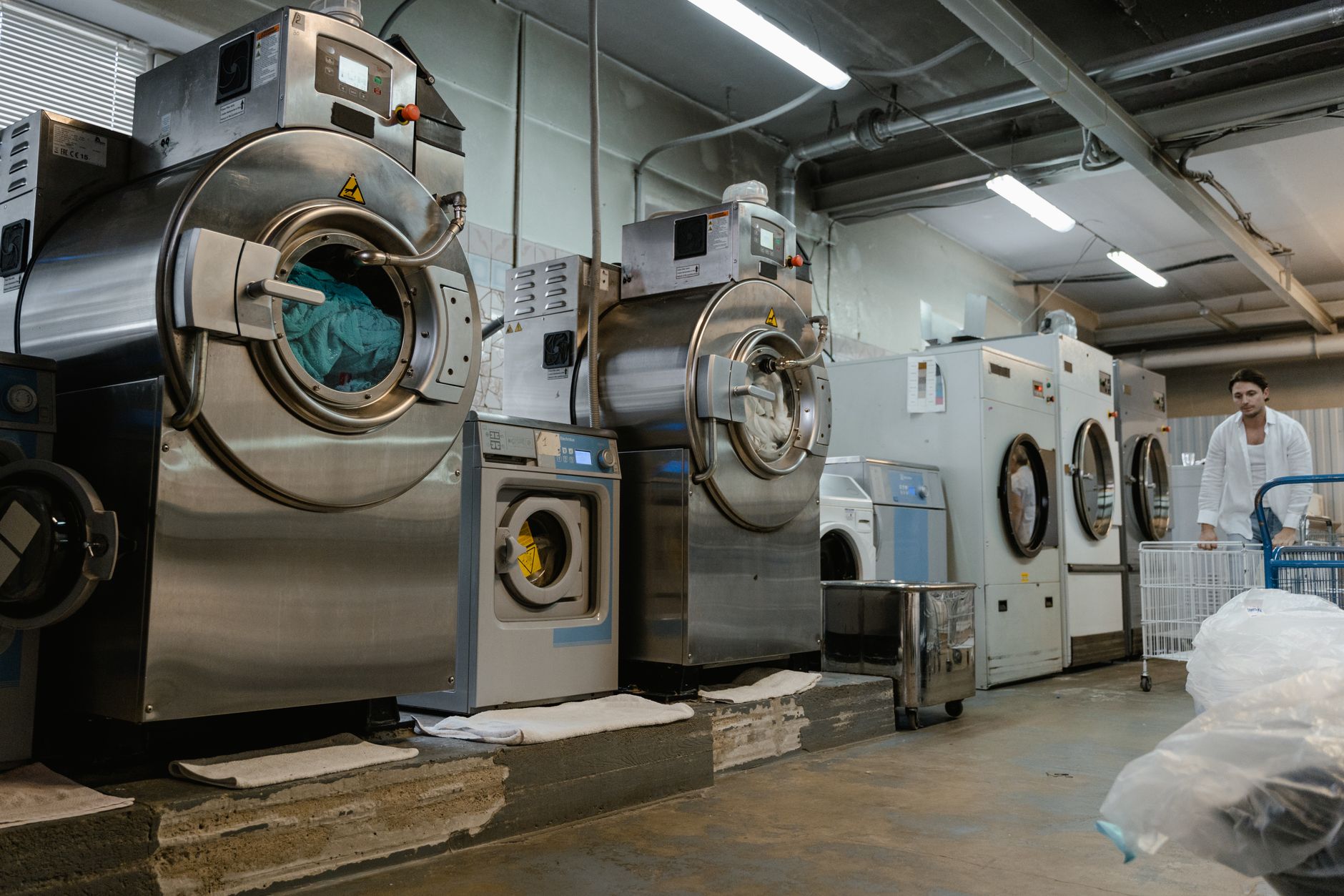 Industrial washdown area where containers are cleaned before returning to production.