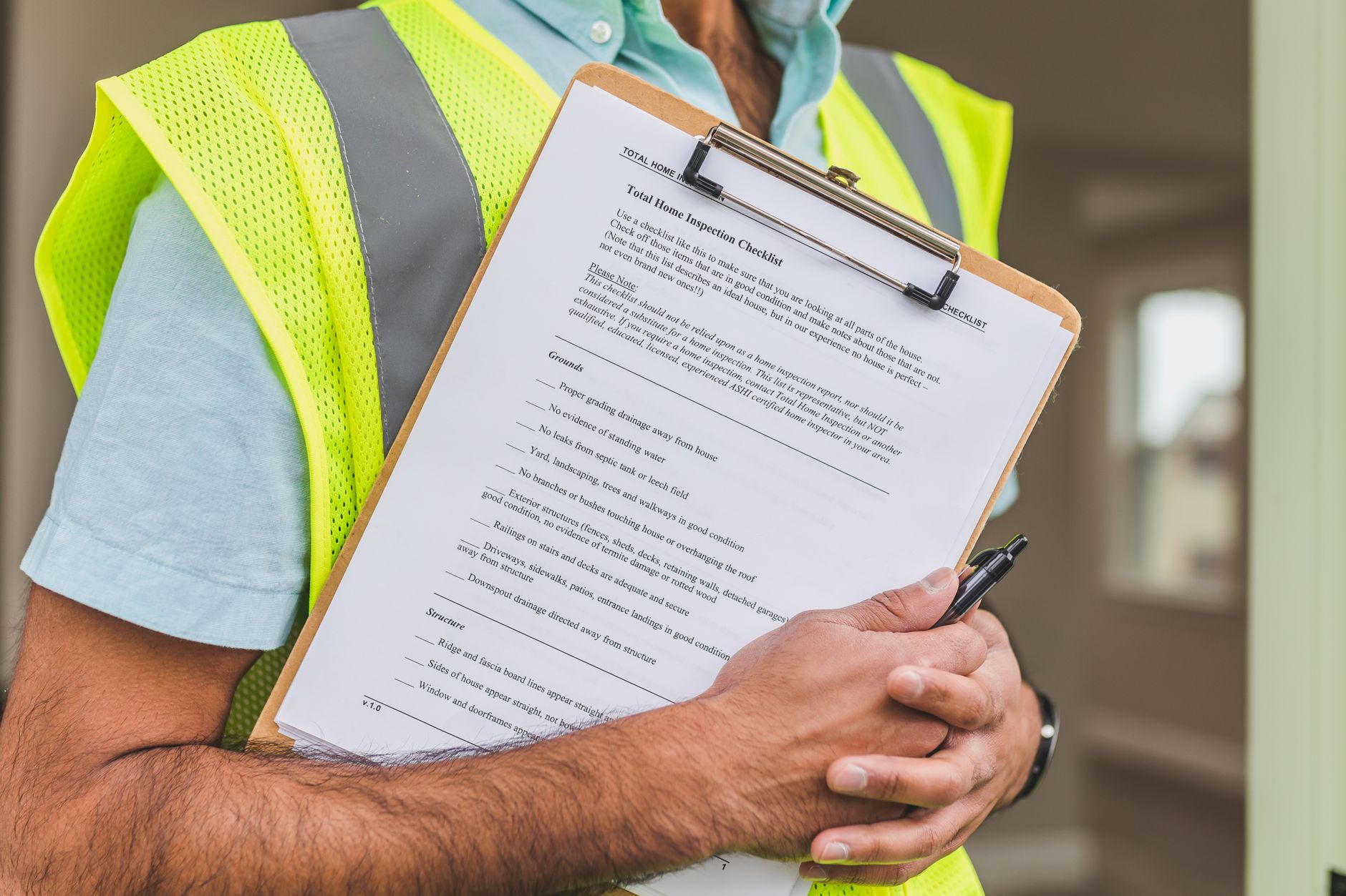 Close view of maintenance paperwork and a checklist at a workbench, reflecting controlled handoffs and documented status in an MRO workflow.