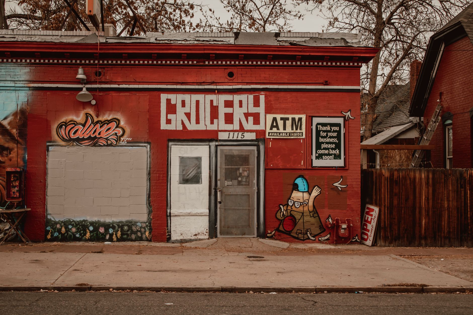 Neighborhood grocery storefront on a city street