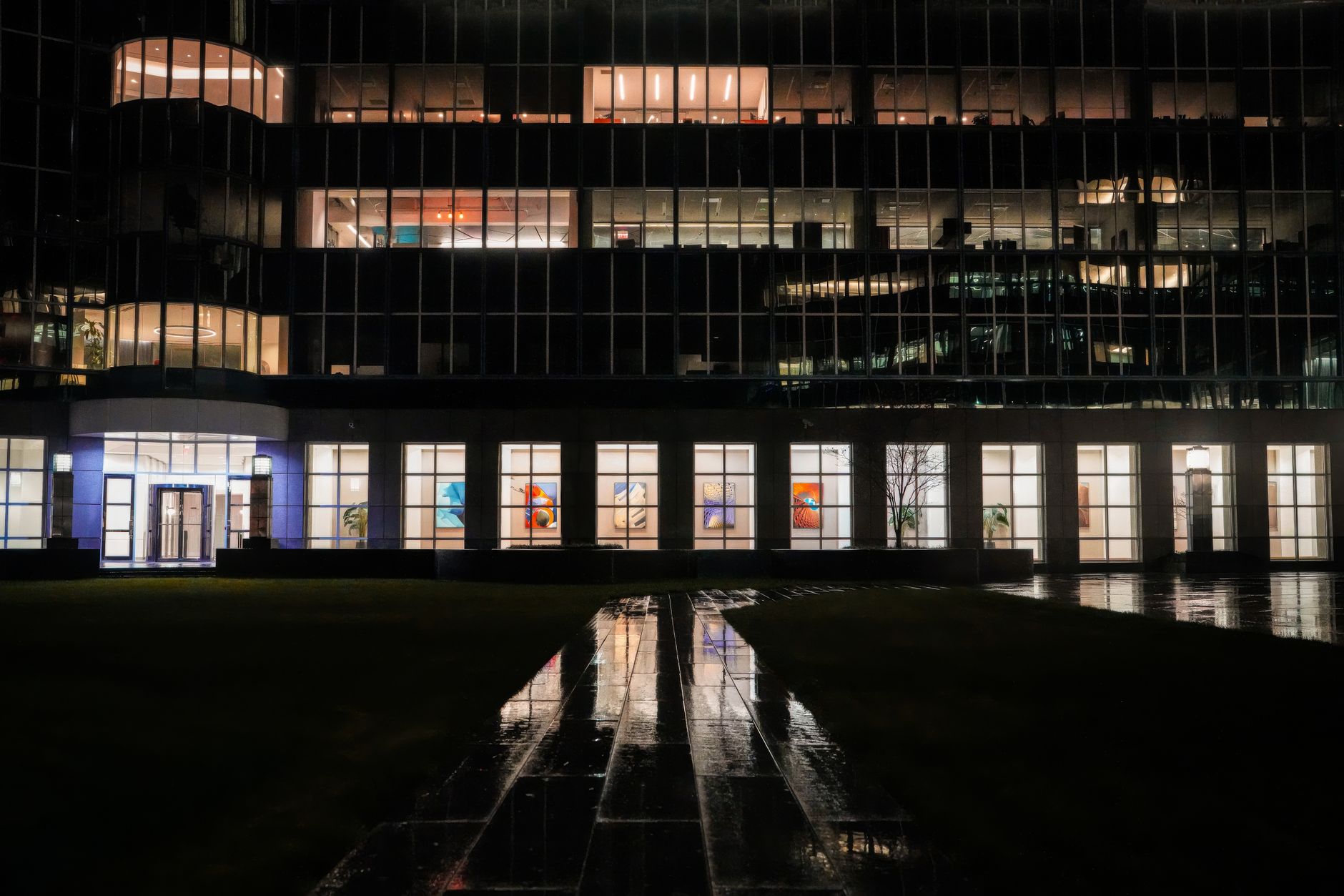 A clean, empty office at night, illustrating how robotic cleaning fleets operate after hours without disrupting tenants.