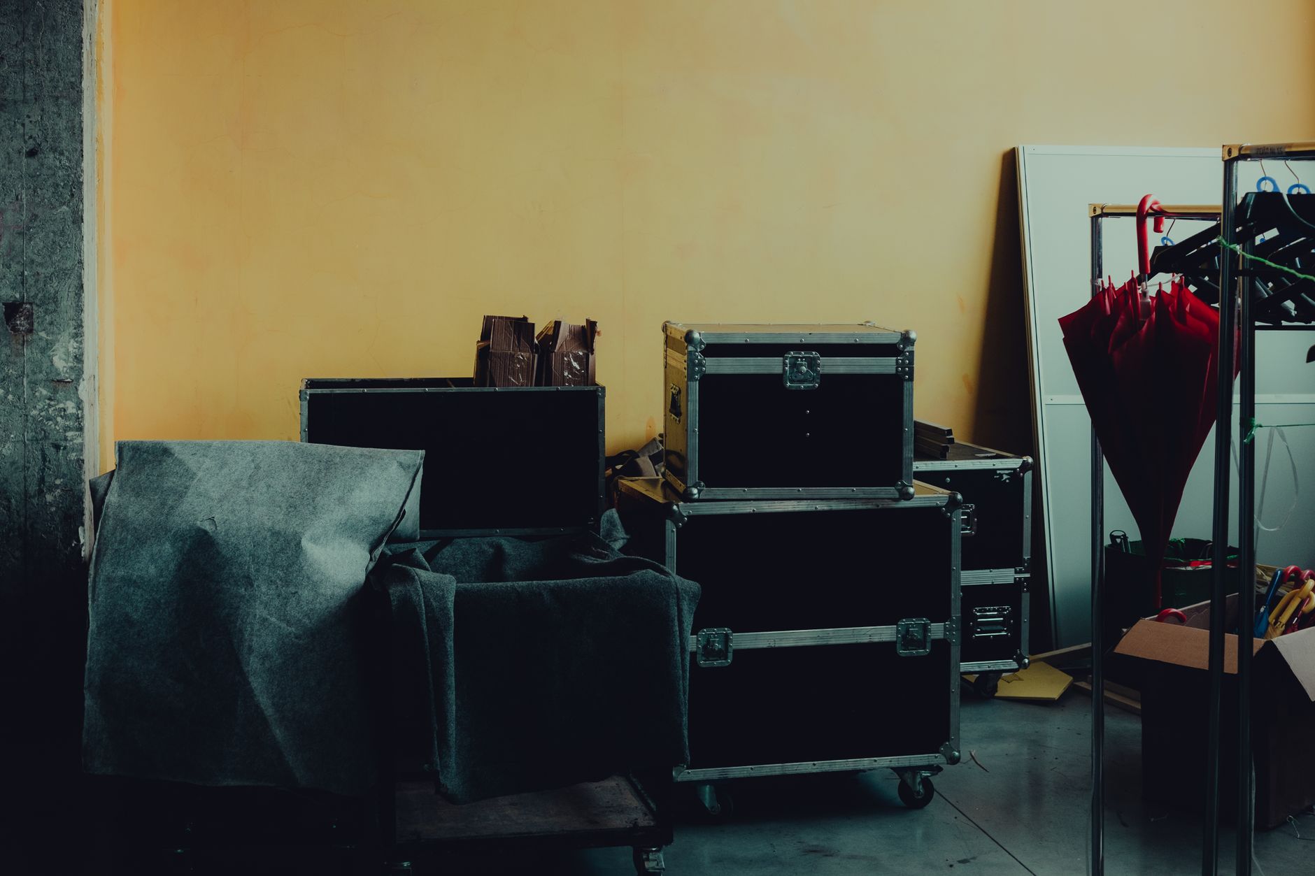 A warehouse staging area with clear buffer space and pallet lanes, representing the natural dwell points where AMRs can top up during normal pauses.