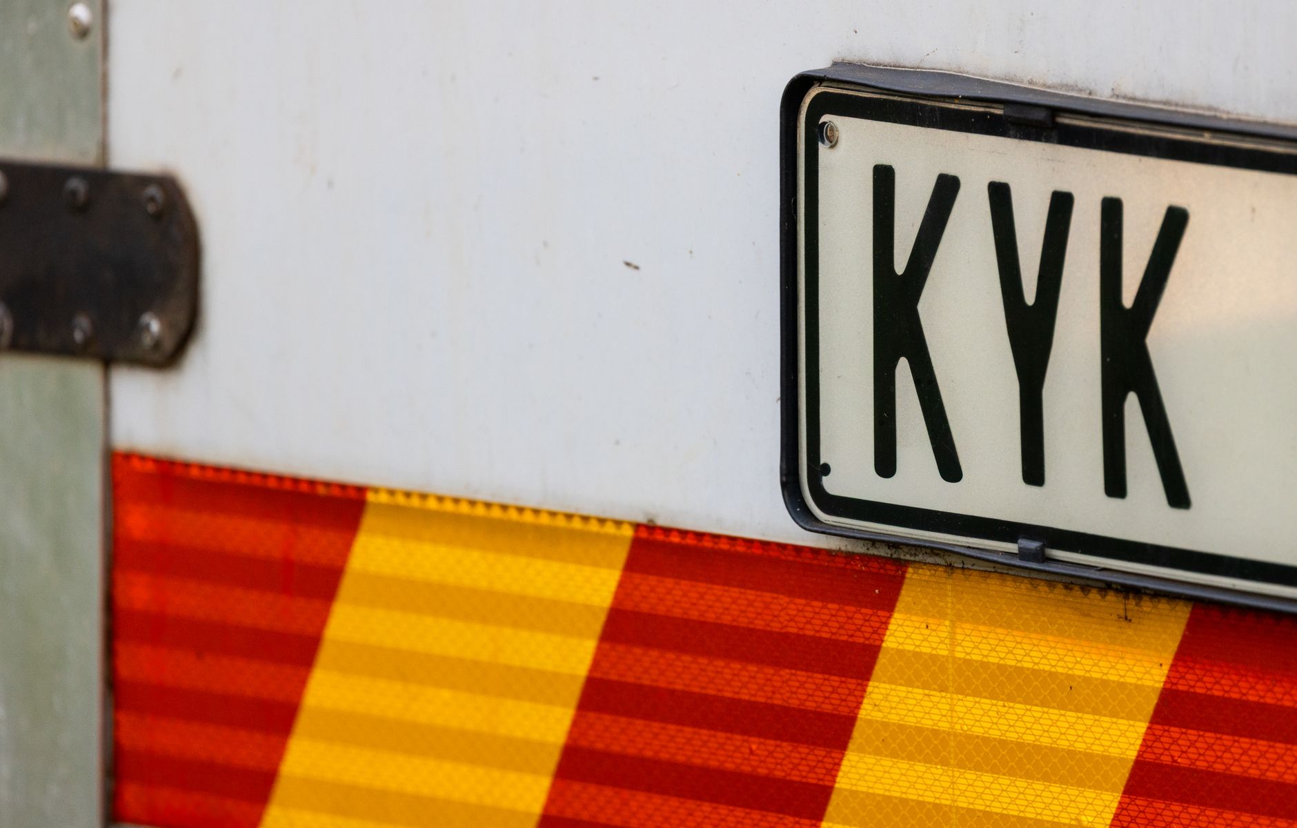 Close view of a vehicle license plate illustrating the identity details patrol systems must capture clearly.