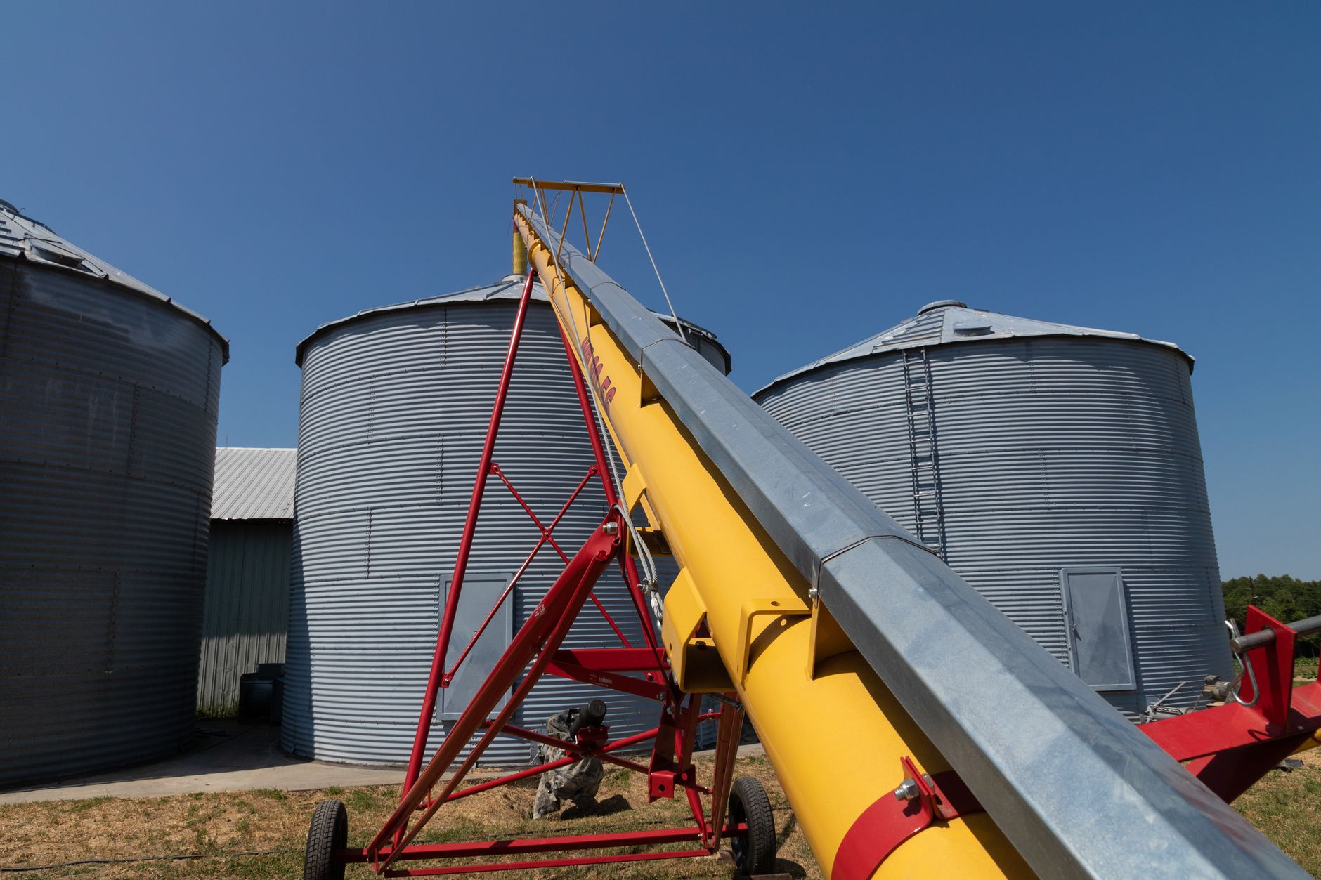 Combustible dust accumulation context in a bulk materials environment where robot decks must stay clean.