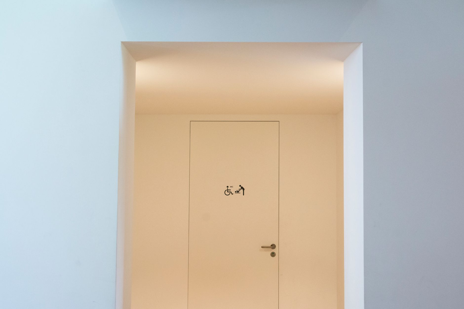 The floor area at a busy office restroom entrance, where repeatable touchup passes and scheduled checks are easiest to standardize.