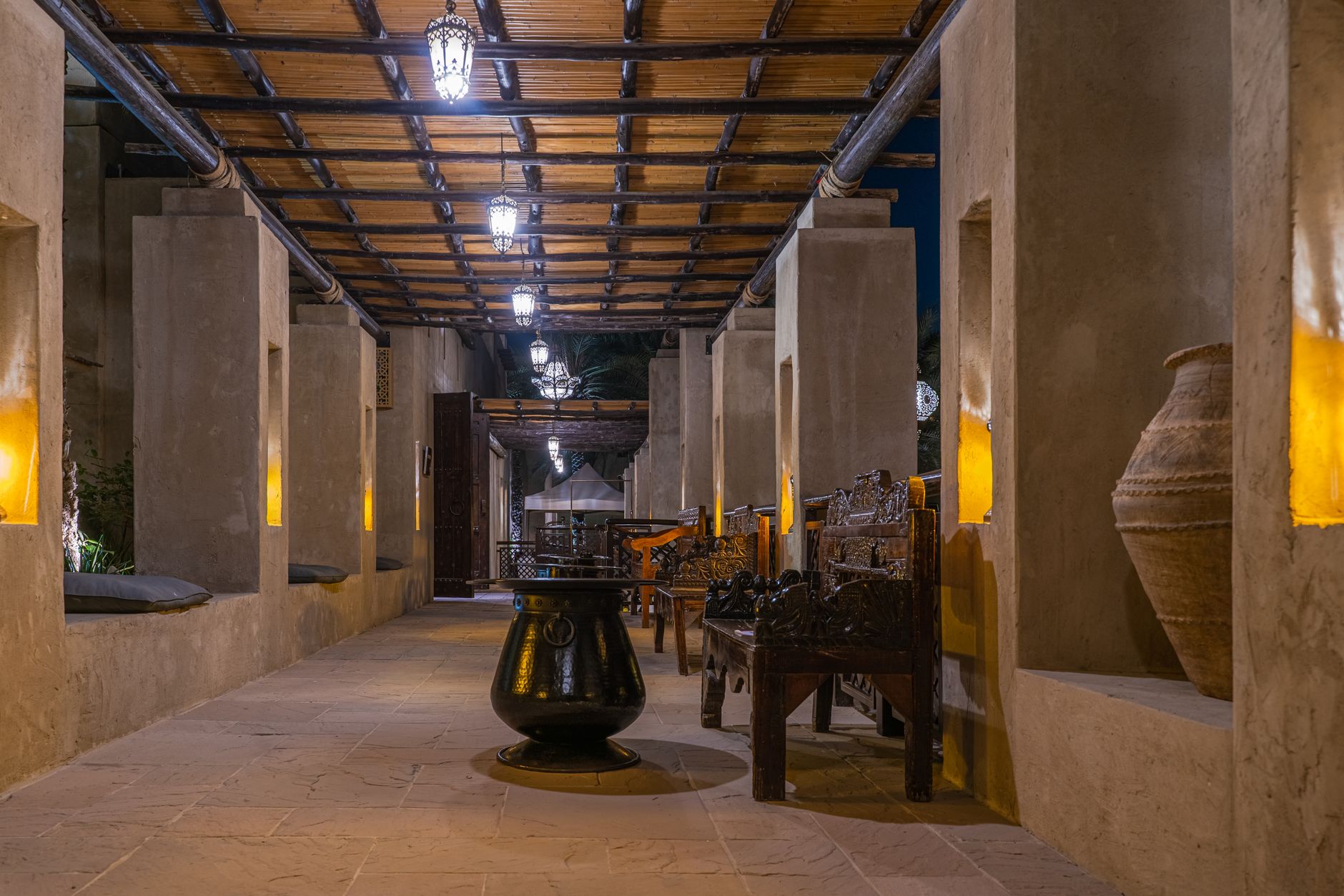 A long, quiet hotel corridor at night, a perfect environment for autonomous robots performing overnight cleaning tasks.