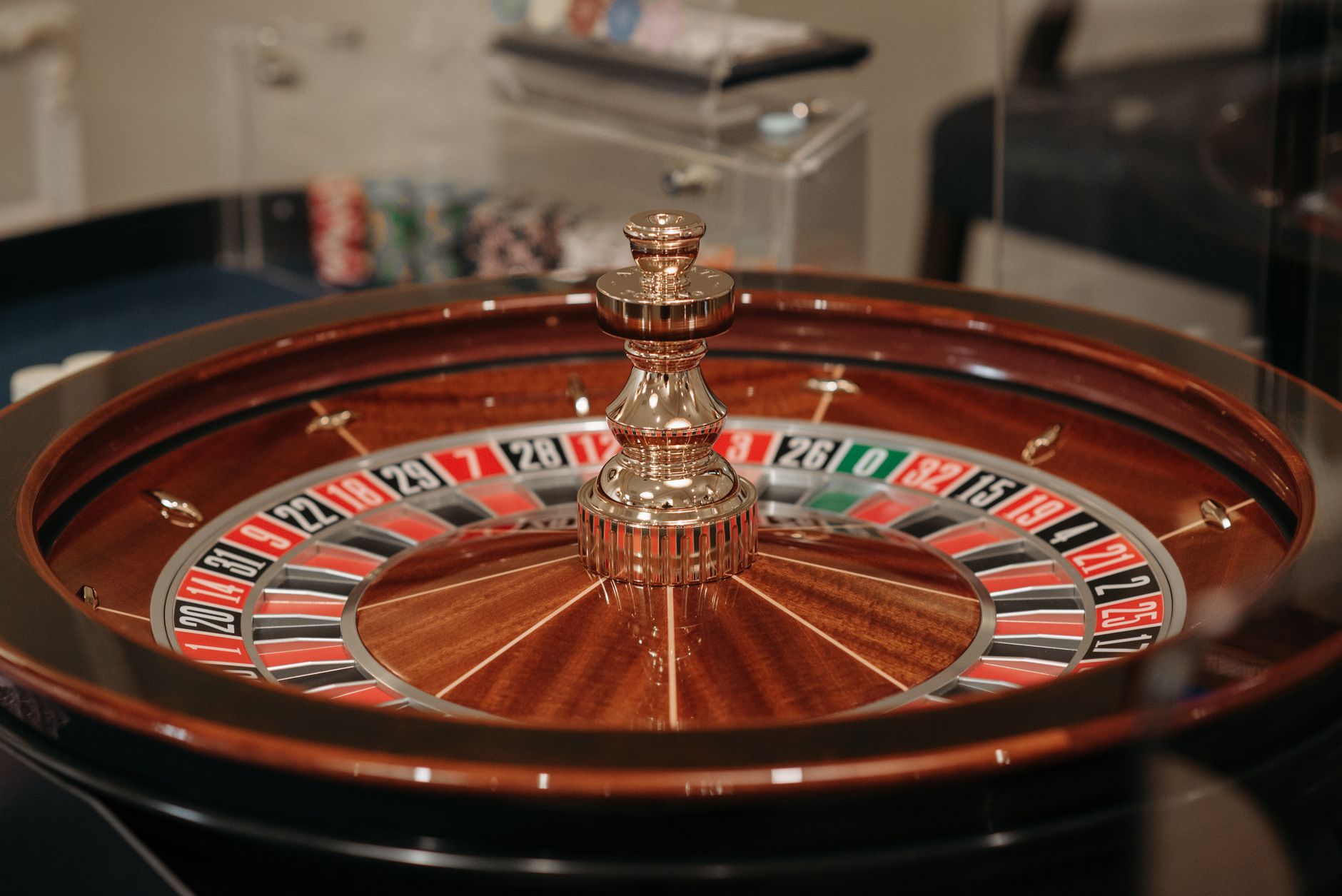A vast, perfectly polished and reflective floor stretches across a luxury casino, ready for the evening's guests.