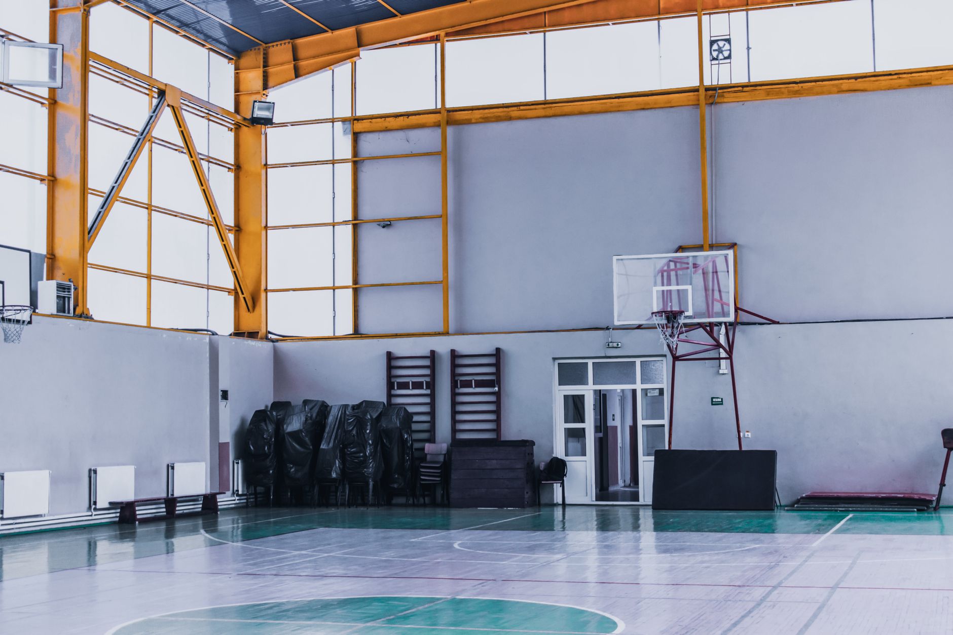 An empty 24-hour gym floor at night, clean and ready for the next day's members.