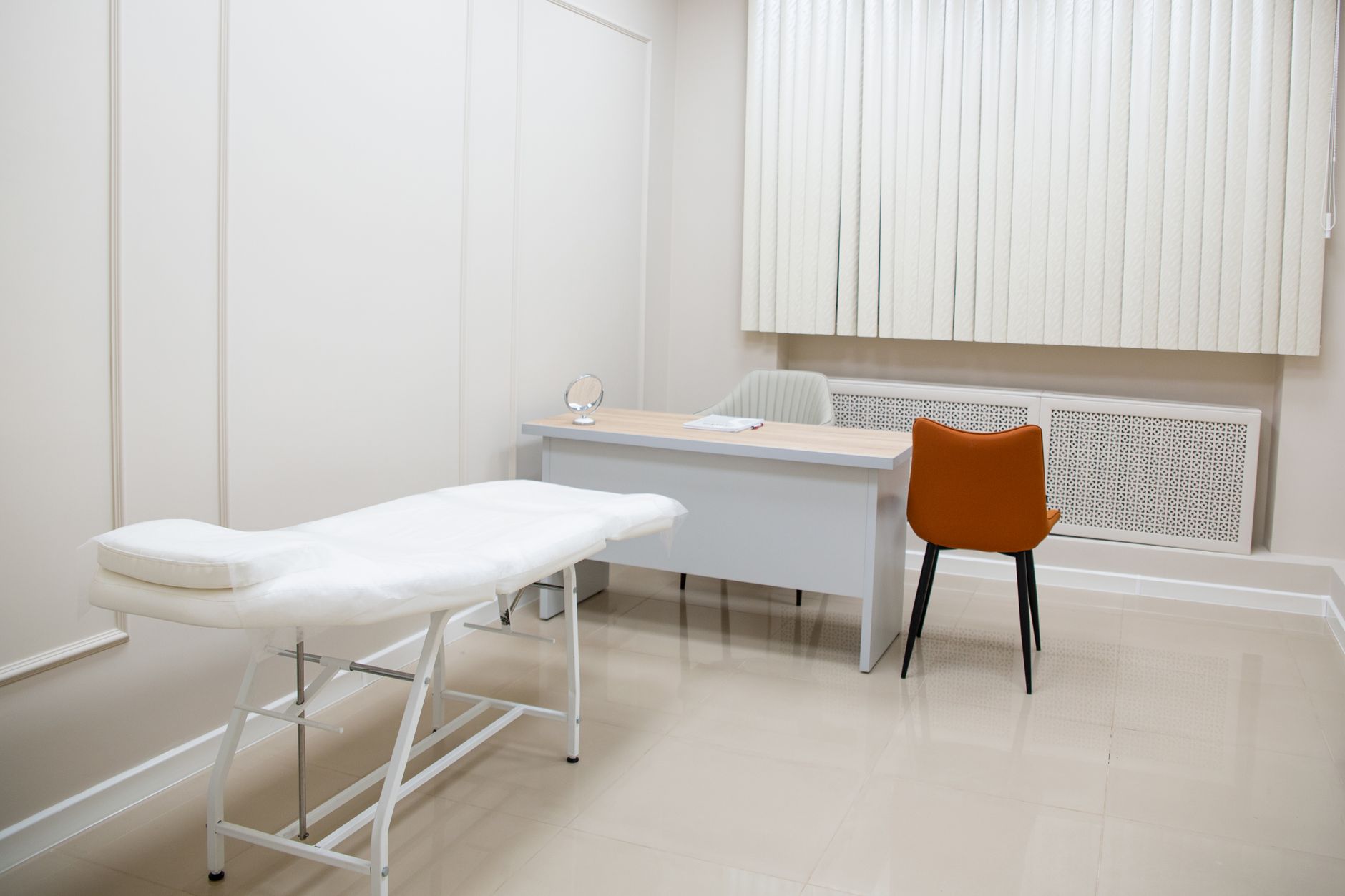 A private medical consultation room suited to confidential donor screening conversations.