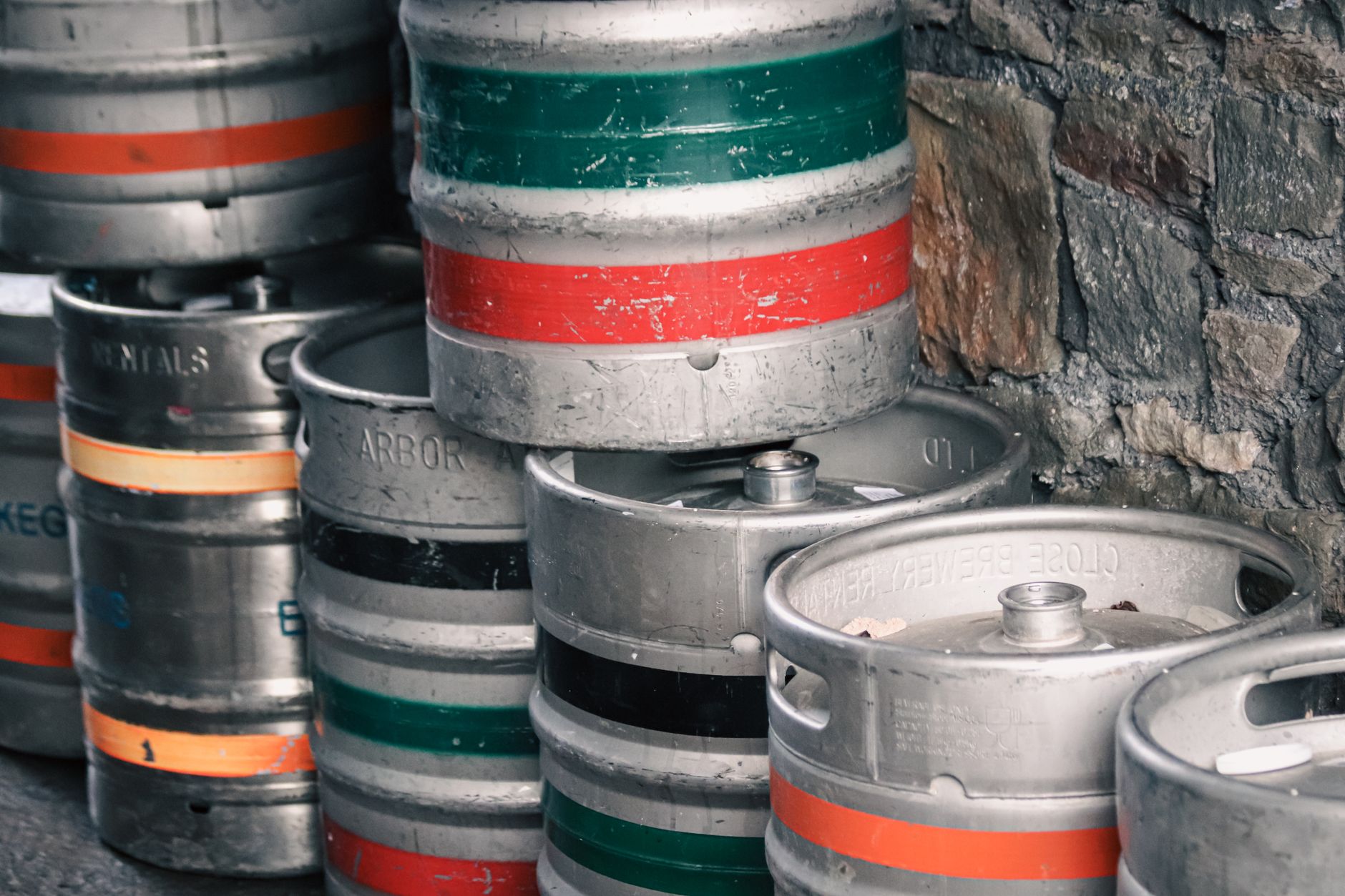 Stacked steel drums showing chime and bung variation the cell must recipe-match.
