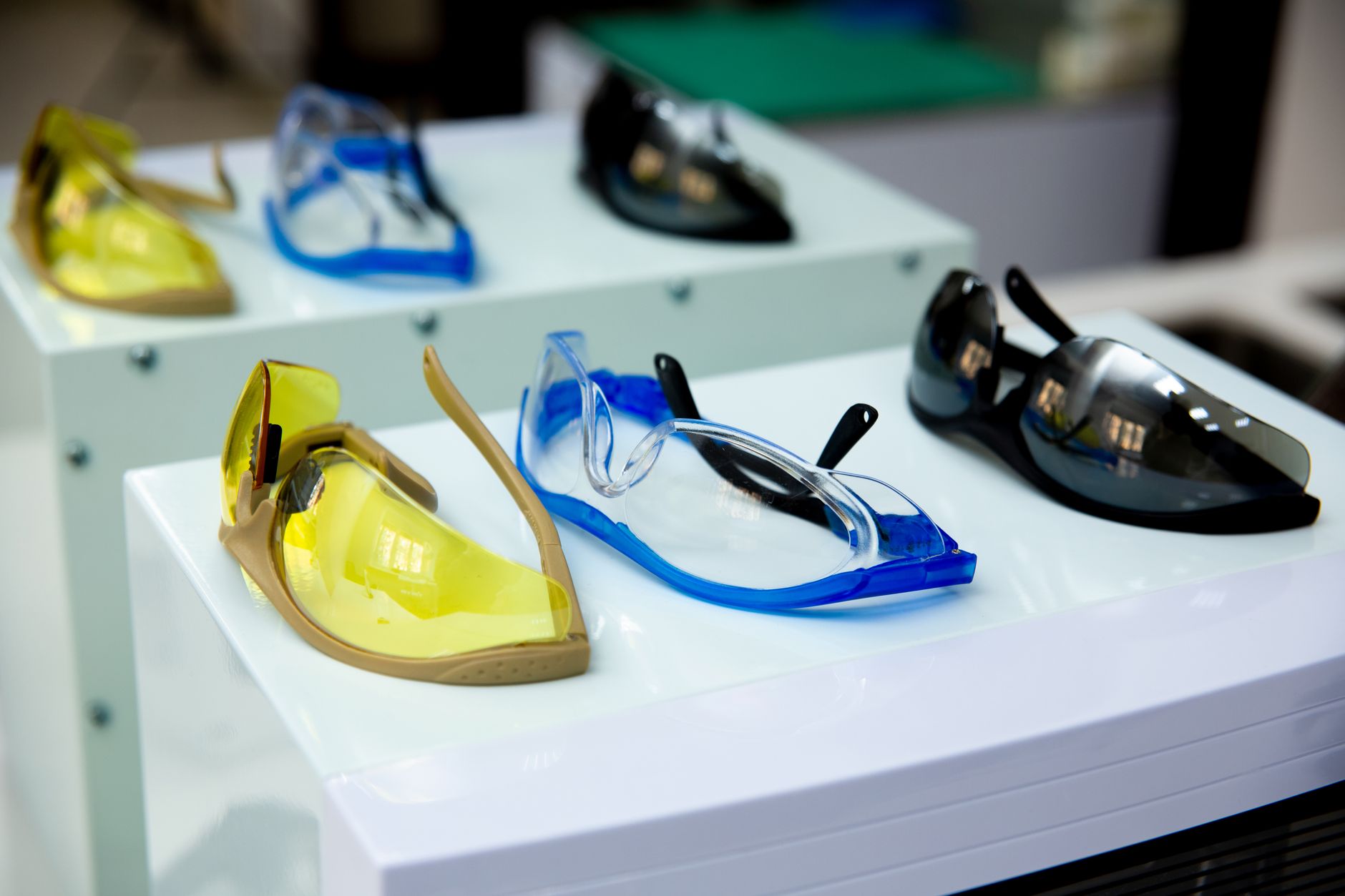 Protective laser safety eyewear representing the controls required around an enclosed surgical-instrument marking process.