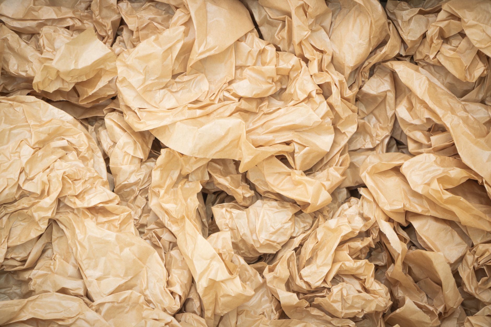 Stacks of kraft interleaving paper like separators placed between glass sample chips.