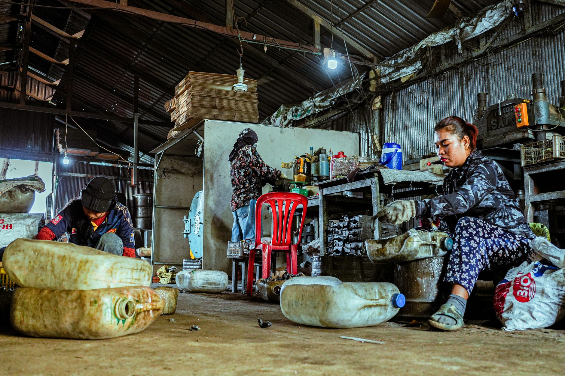 A dusty industrial floor near concrete processing equipment where abrasive dust can affect machinery.