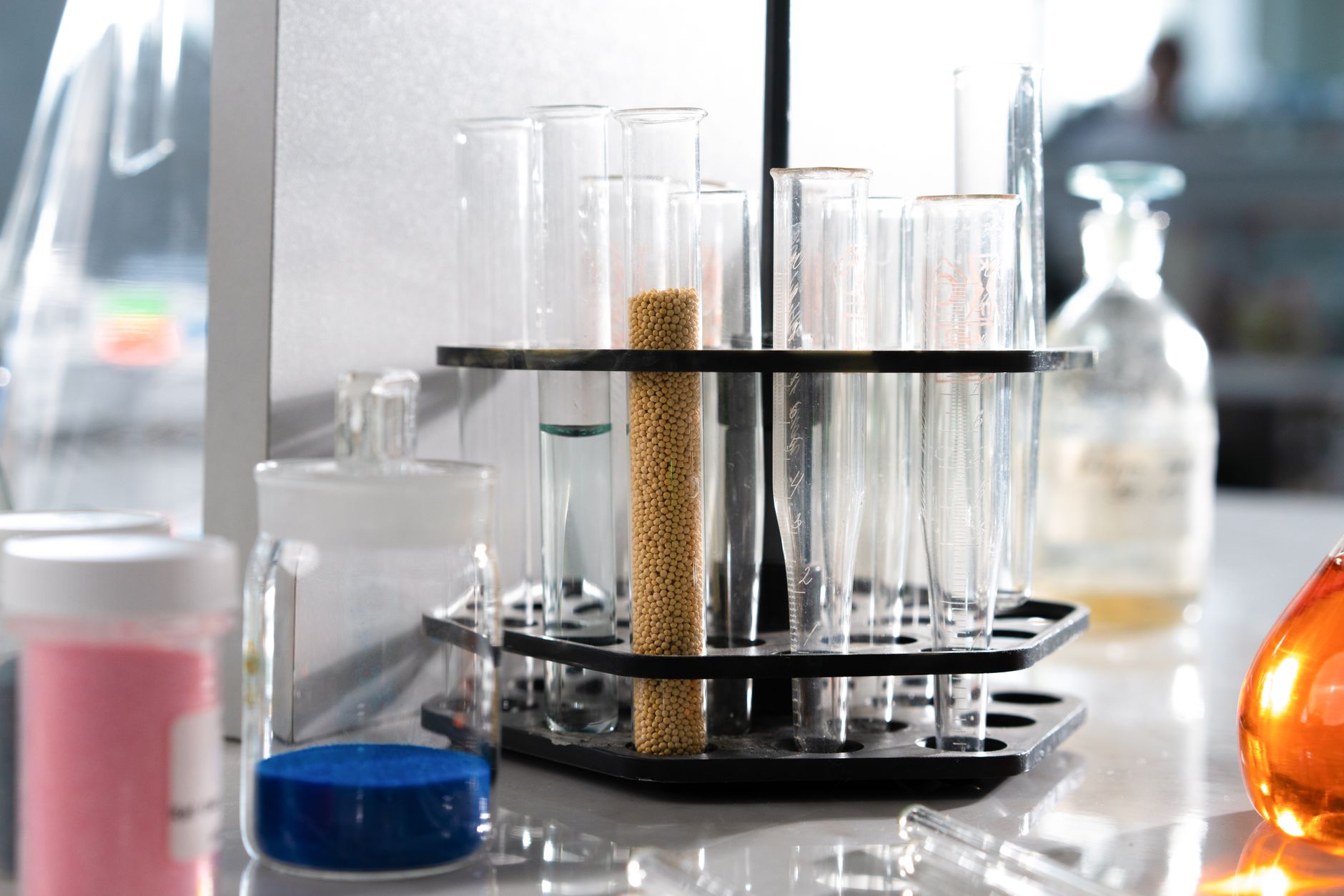Materials testing laboratory bench with mounted metal samples ready for polish and hardness checks.