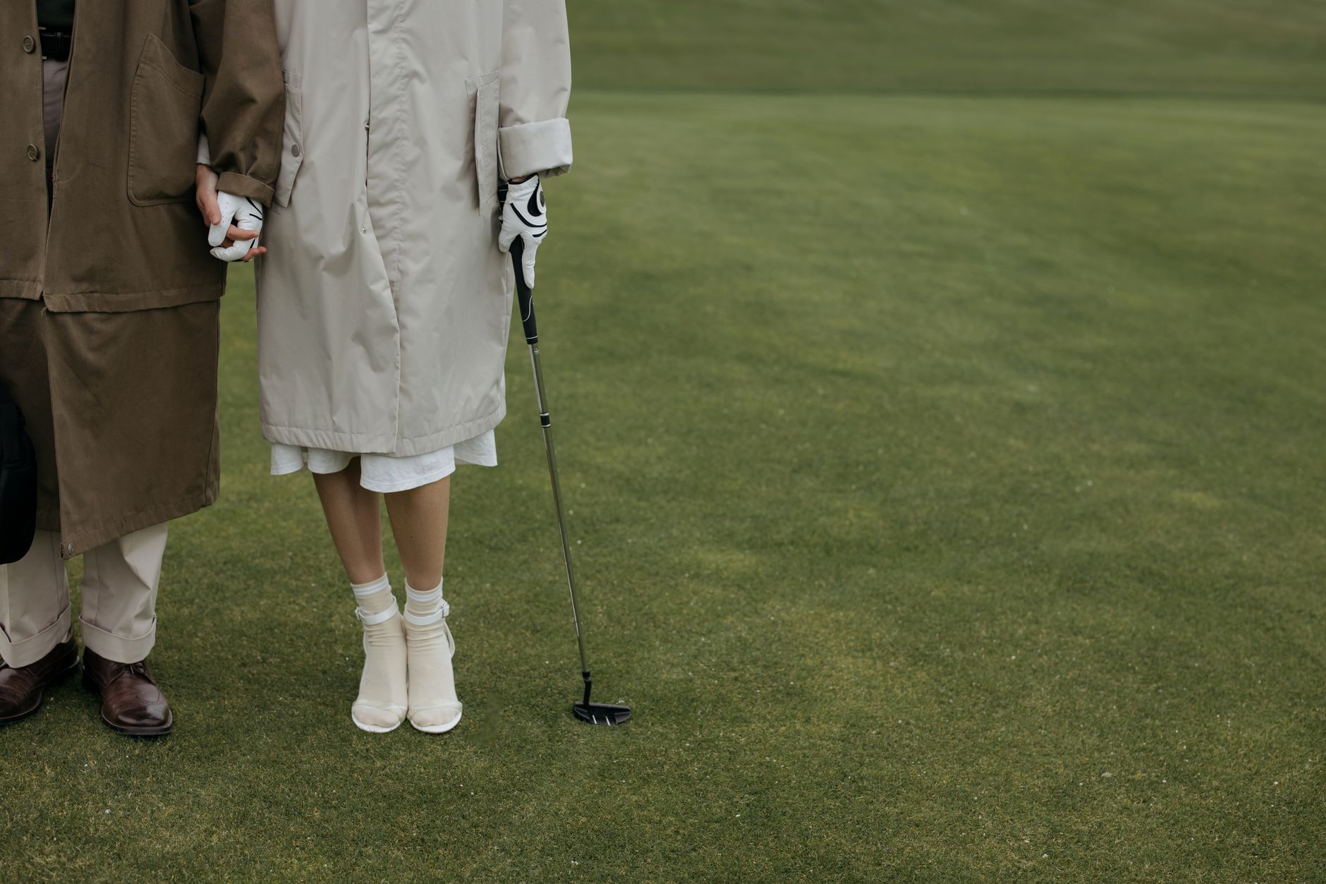 Golf green collar beside fairway turf