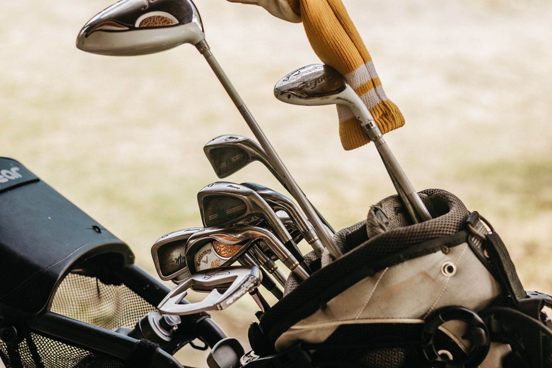 Outdoor patio seating beside a golf club where members gather during the day