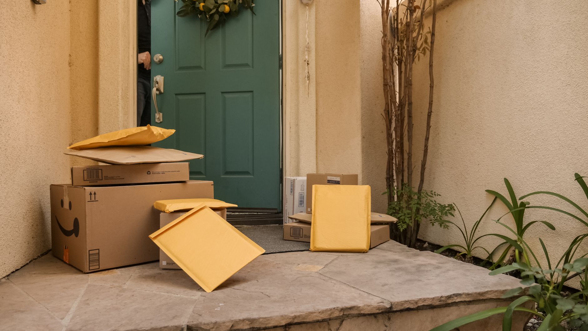 A residential front porch ready for a prescription handoff, reflecting the patient-facing promise of faster home delivery.