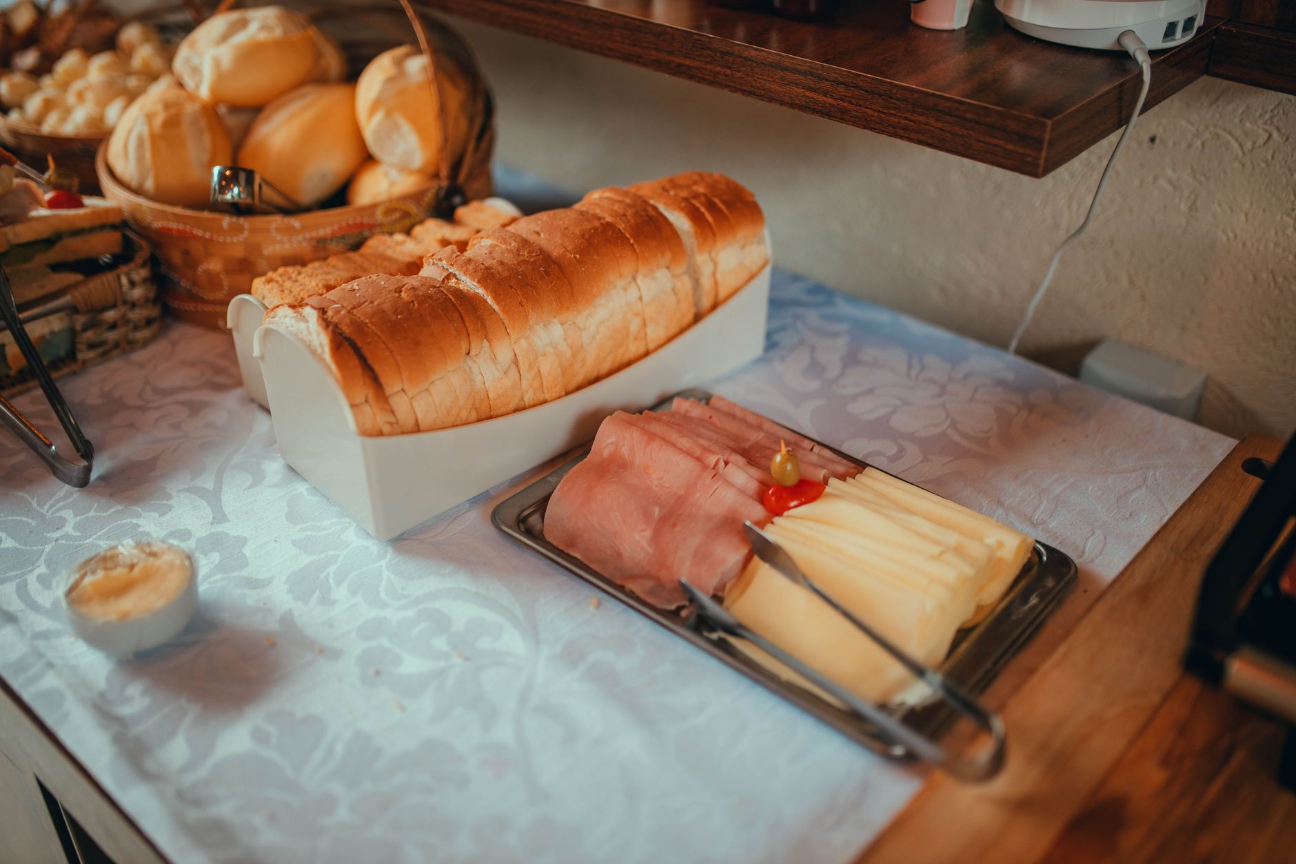 A hotel breakfast buffet with juice and coffee service shows one of the compact sticky-floor zones where heated scrubbing can pay off.