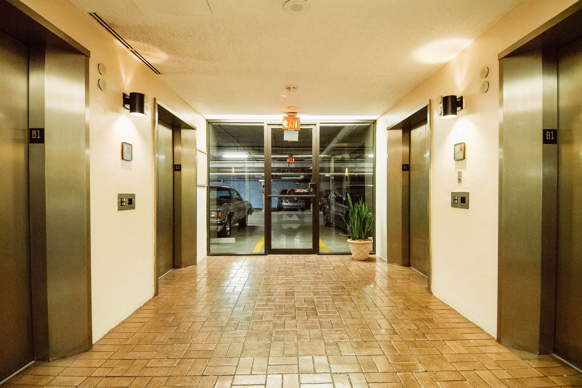 Elevator lobby inside a parking garage, reflecting the guest wayfinding and safety pressure found in casino self-park structures.