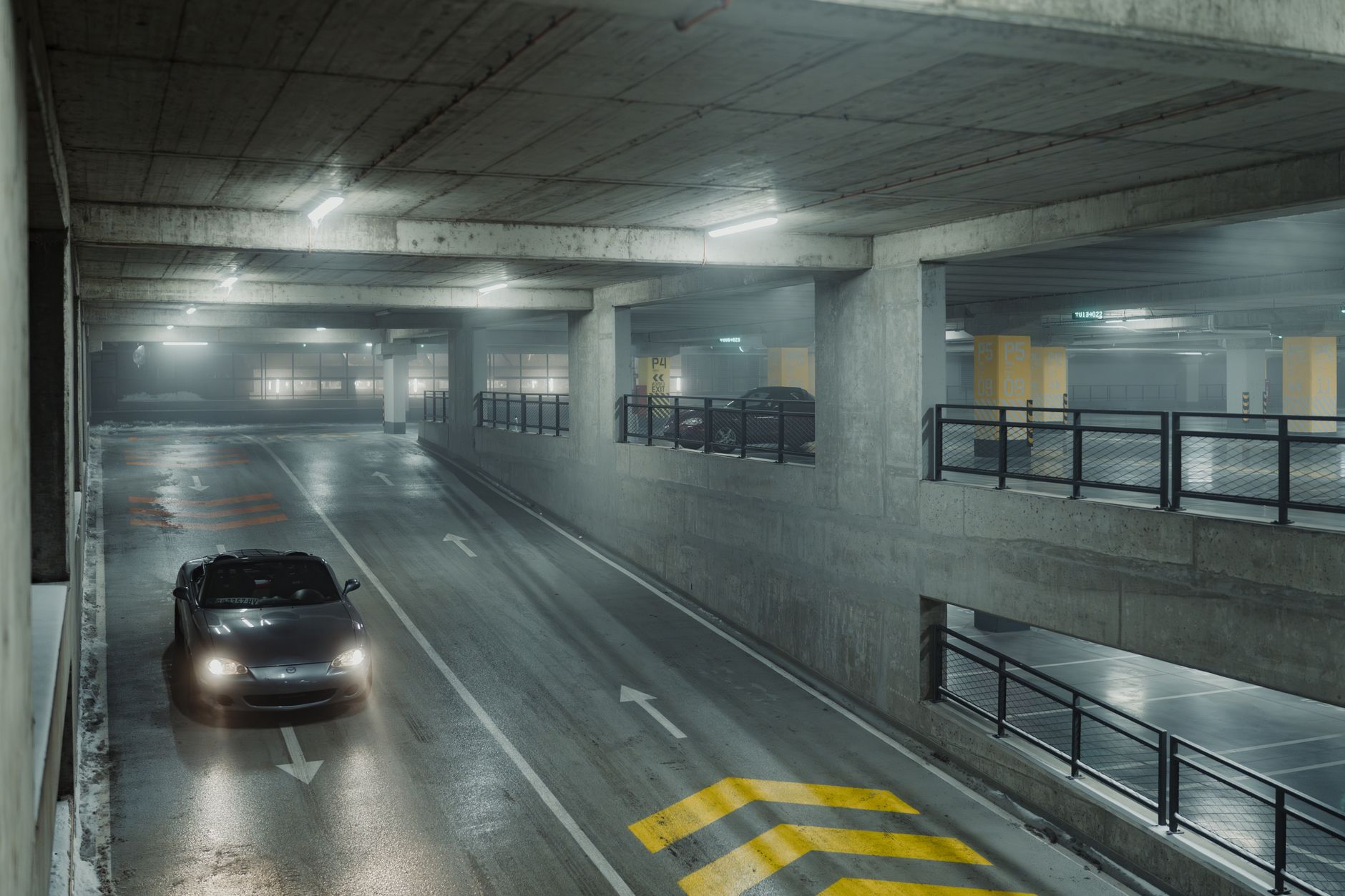 Multi-level self-park garage interior at night, showing lanes, columns, and guest parking areas similar to a casino property.