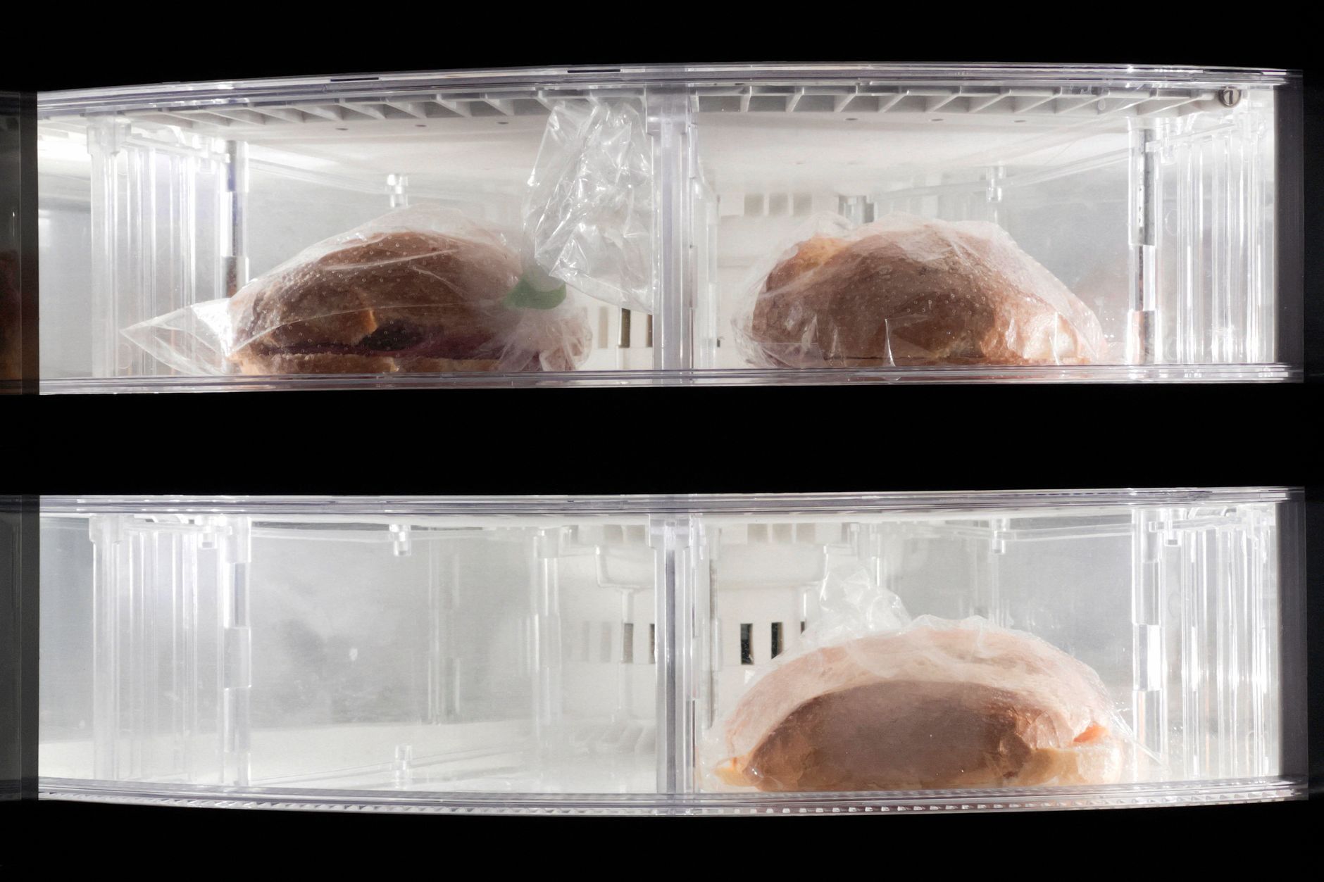 A walk-in freezer door and surrounding panels, the kind of stable doorway view where a fixed thermal camera can trend a failing seal.