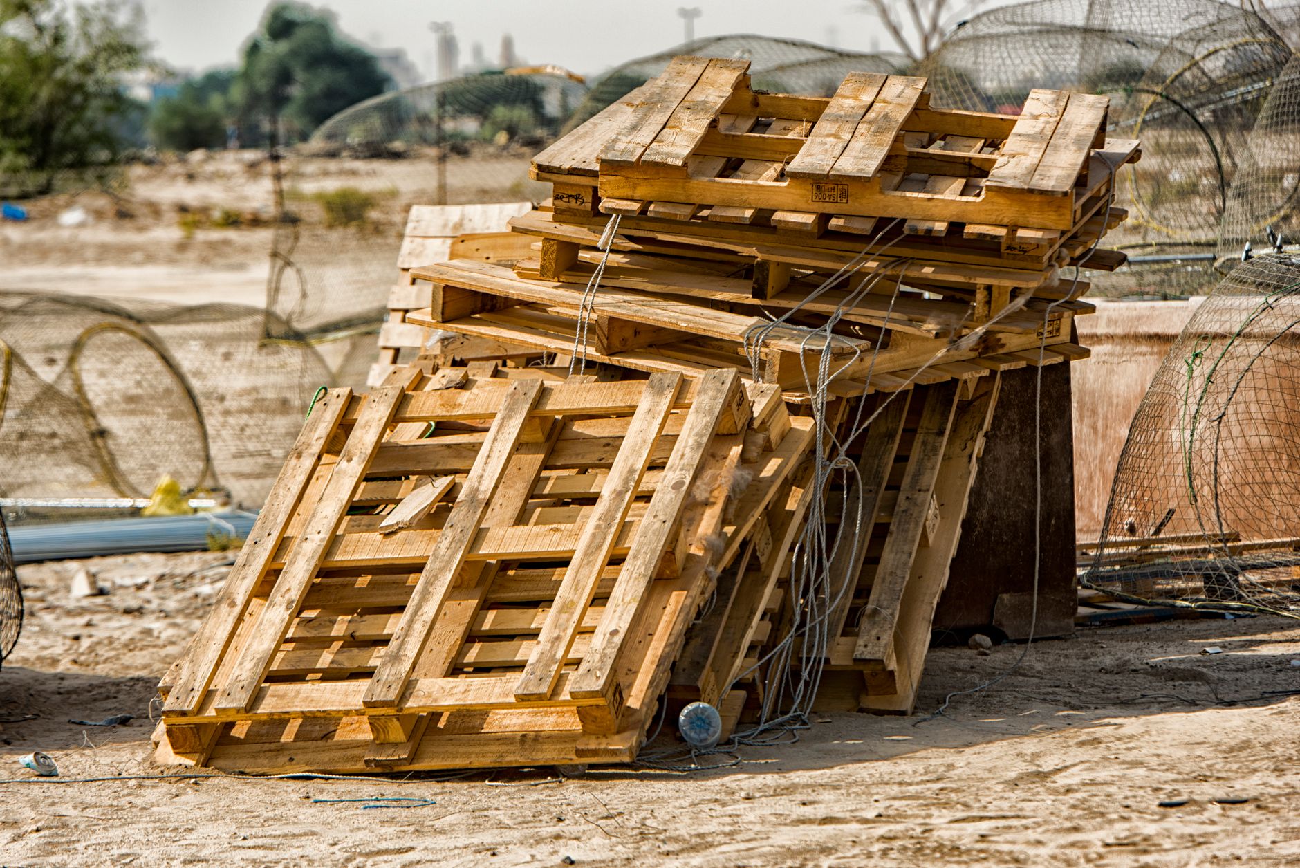 A damaged wooden pallet shows the condition problems that can disrupt a floor-level handoff.