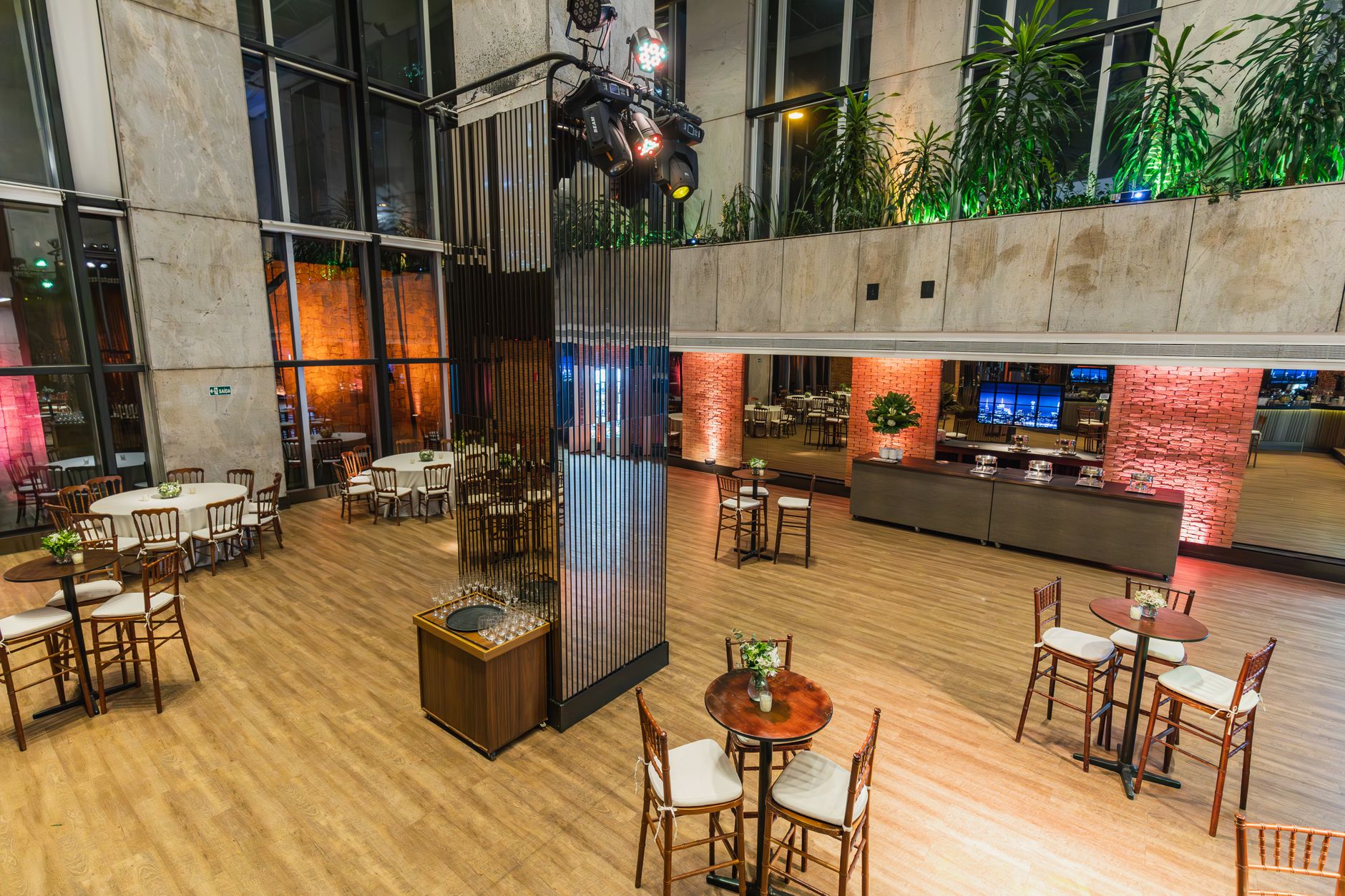 A banquet pre-function space with hard flooring where event setups can block cleaning routes.