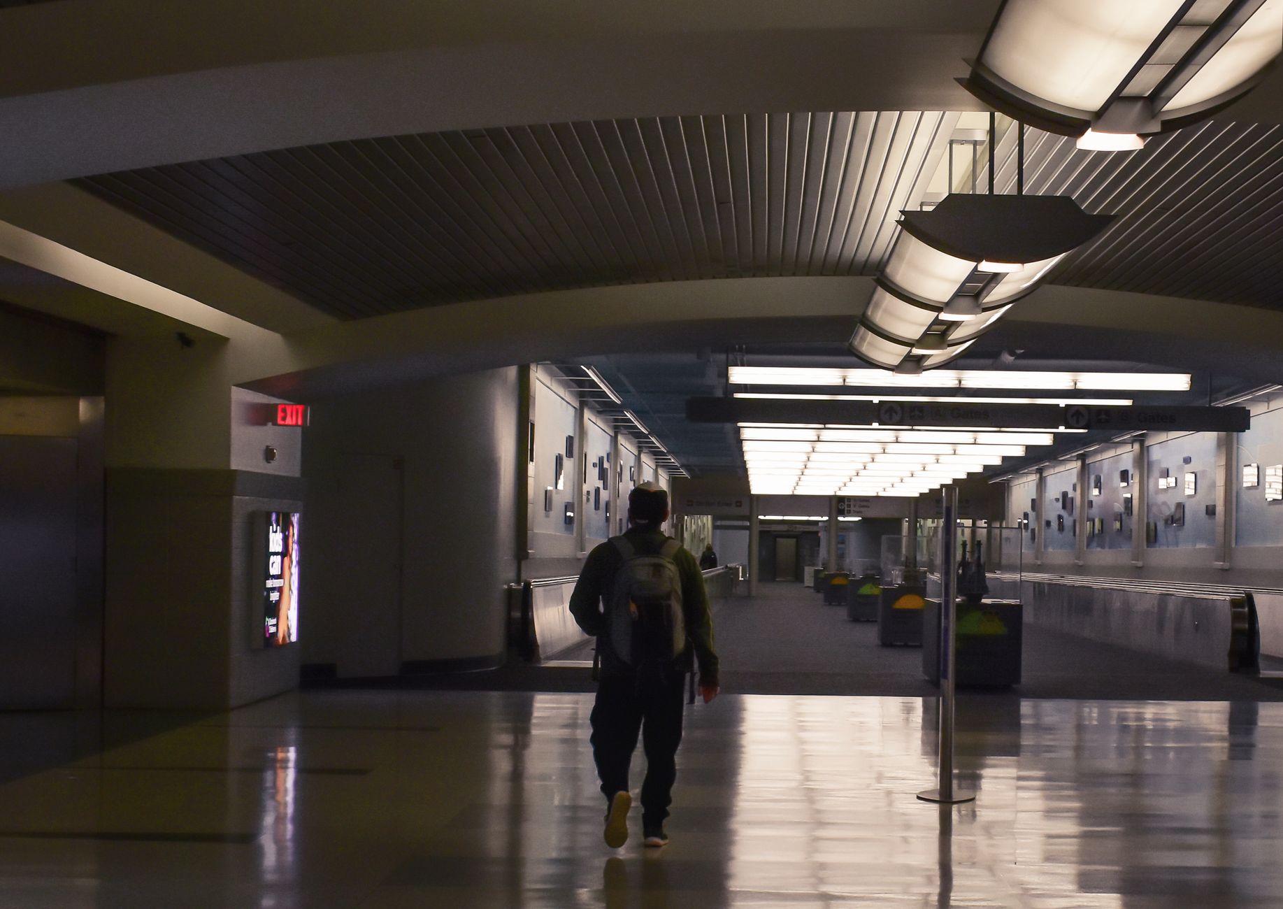 Wide airport corridor during a low-traffic window, the kind of forgiving zone suited to a first cleaning pilot.