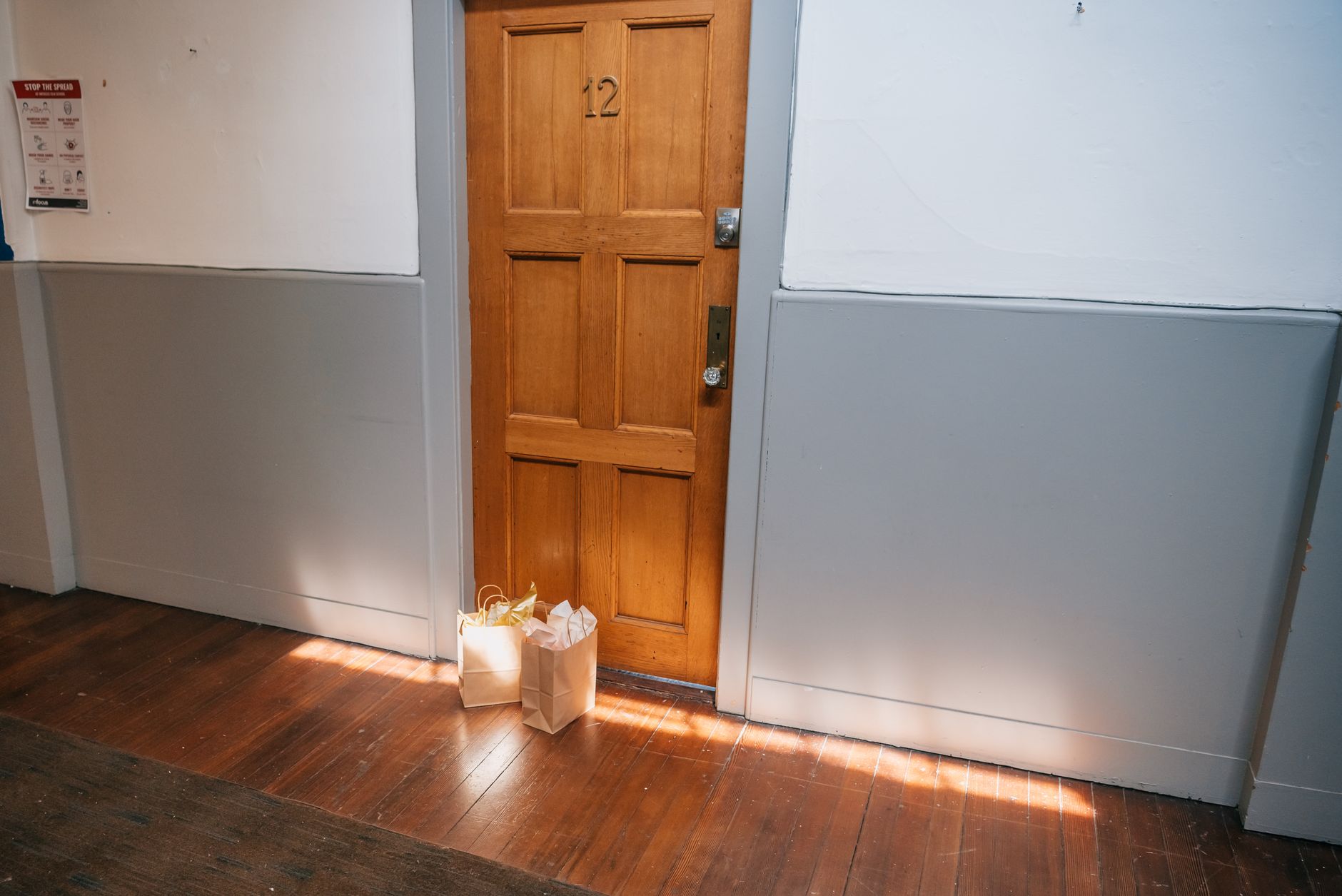 Back-of-house corridor with utility doors and clear sightlines, matching the article's advice to start inspection rounds in narrow procedural spaces.