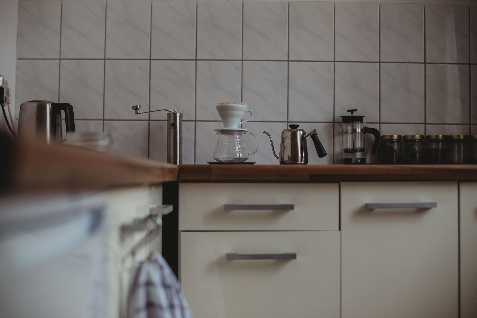 Busy self-serve beverage or checkout area where customer traffic makes daytime floor-cleaning routes more sensitive.
