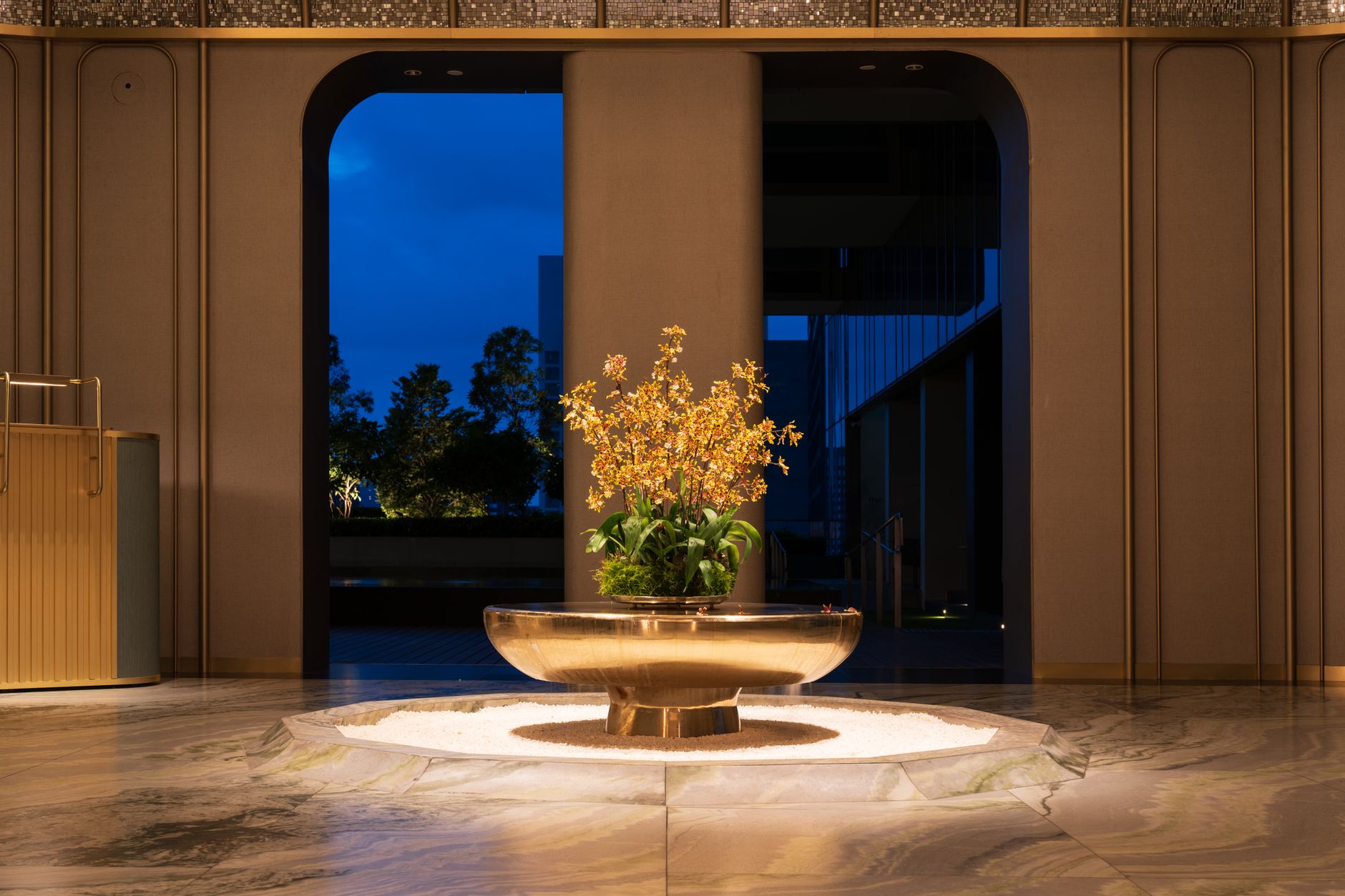 Upscale hotel lobby at night, setting the scene for a smaller casino hotel weighing practical operations investments.