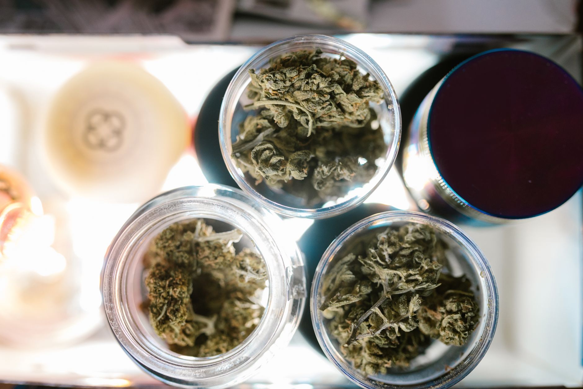 An orderly cannabis dispensary sales floor stands empty and ready for after-hours cleaning.