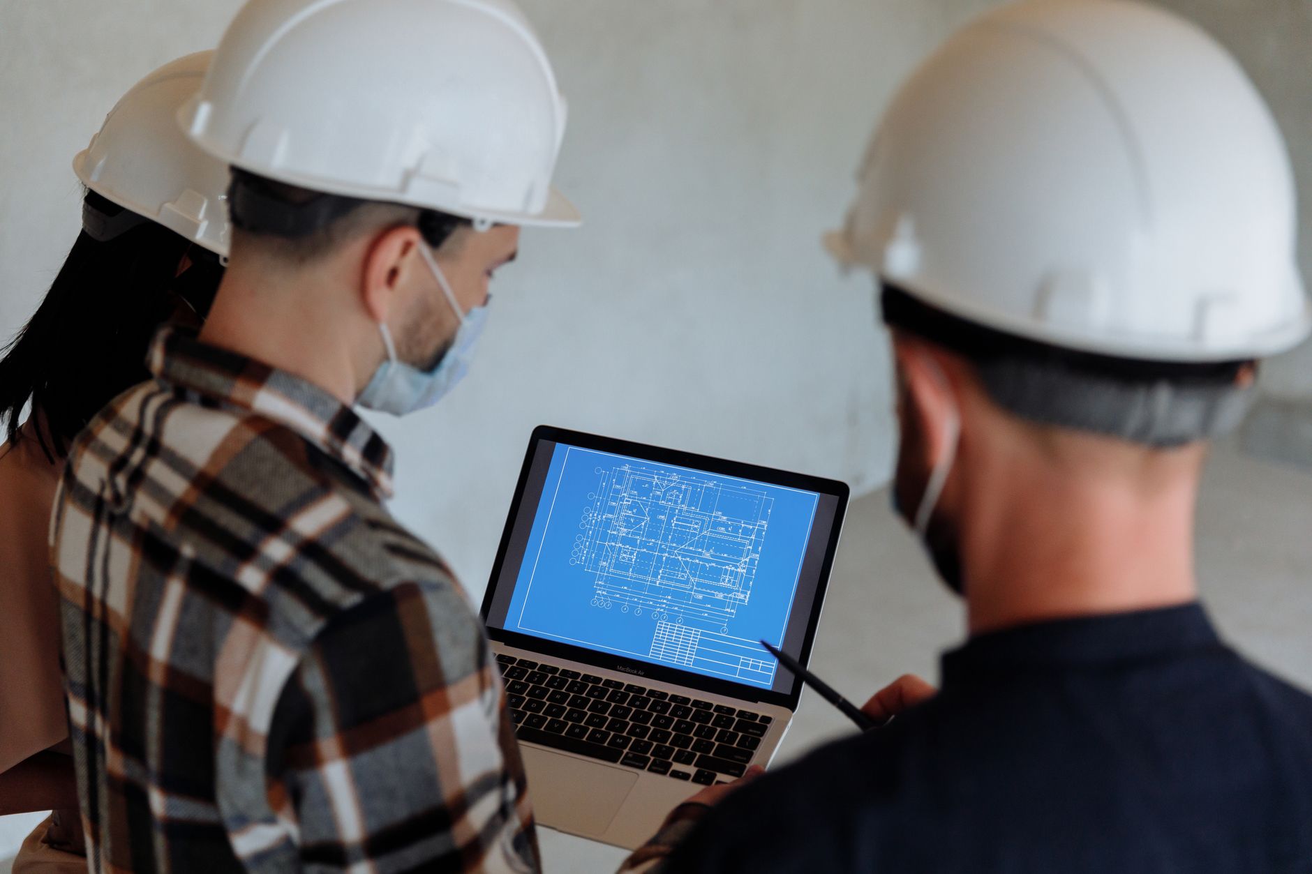 Facility professionals review corridor conditions together during an on-site safety inspection.