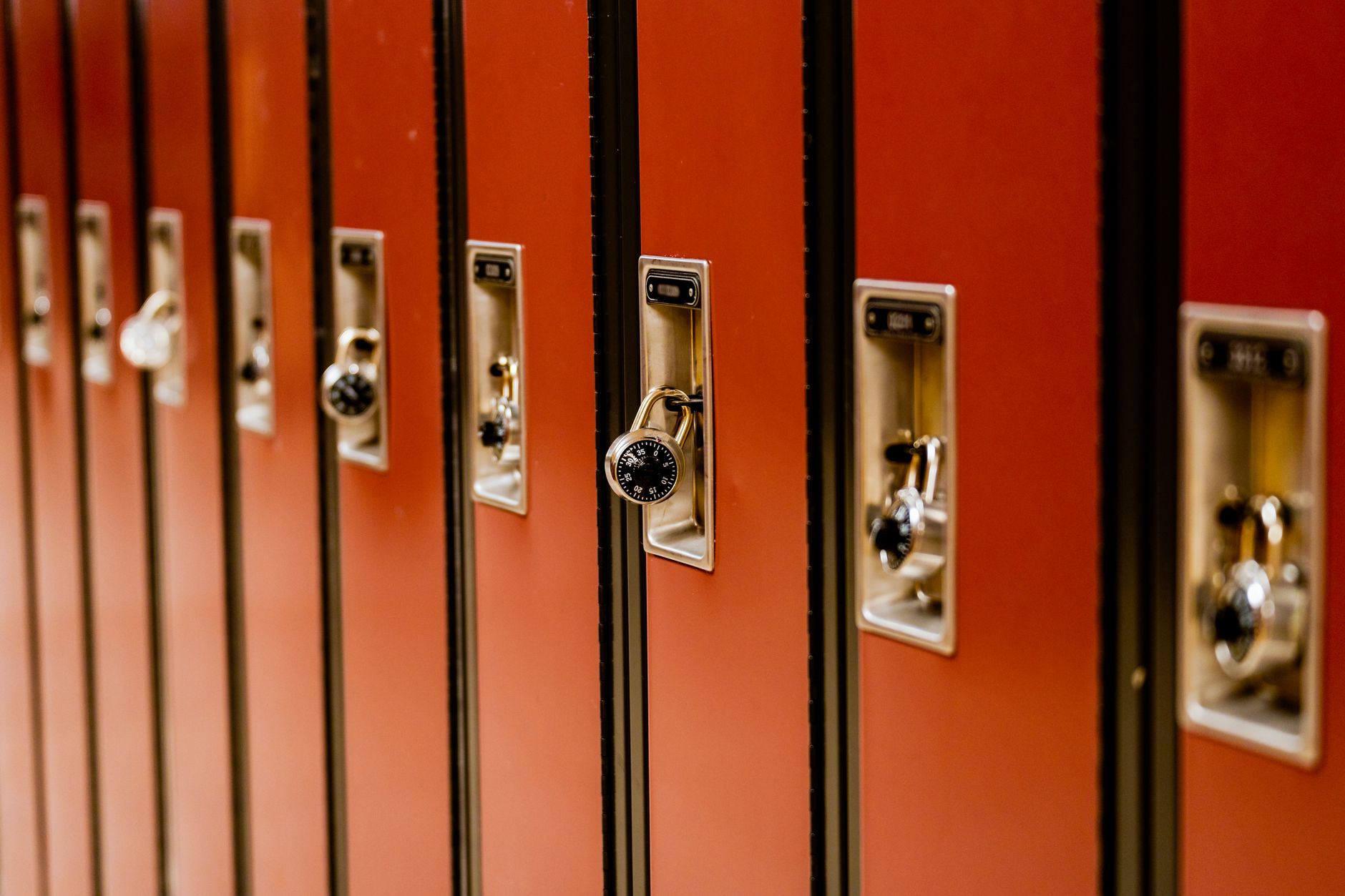 A quiet, secure institutional hallway with hard floors and controlled sightlines, matching the kind of staff-managed jail corridor suited for an early cleaning pilot.