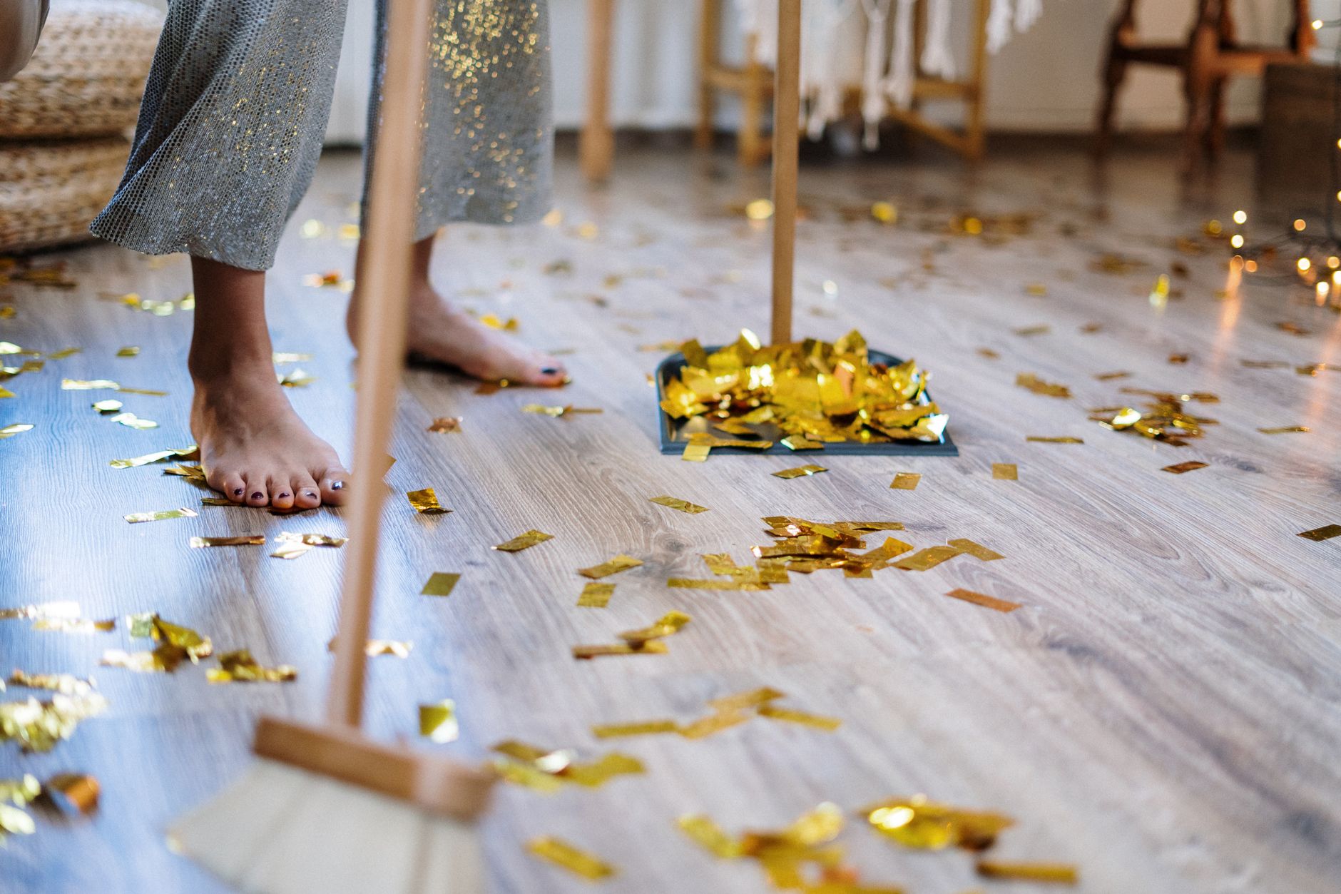 Staff resetting a party room after guests leave, the kind of nightly turnover work that has to happen before an autonomous cleaning route can run reliably.