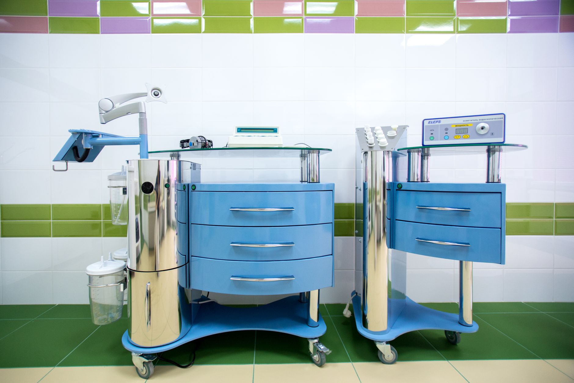 A hospital medication cart or supply handoff area that suggests repetitive back-of-house transport work suitable for an initial ED pilot.