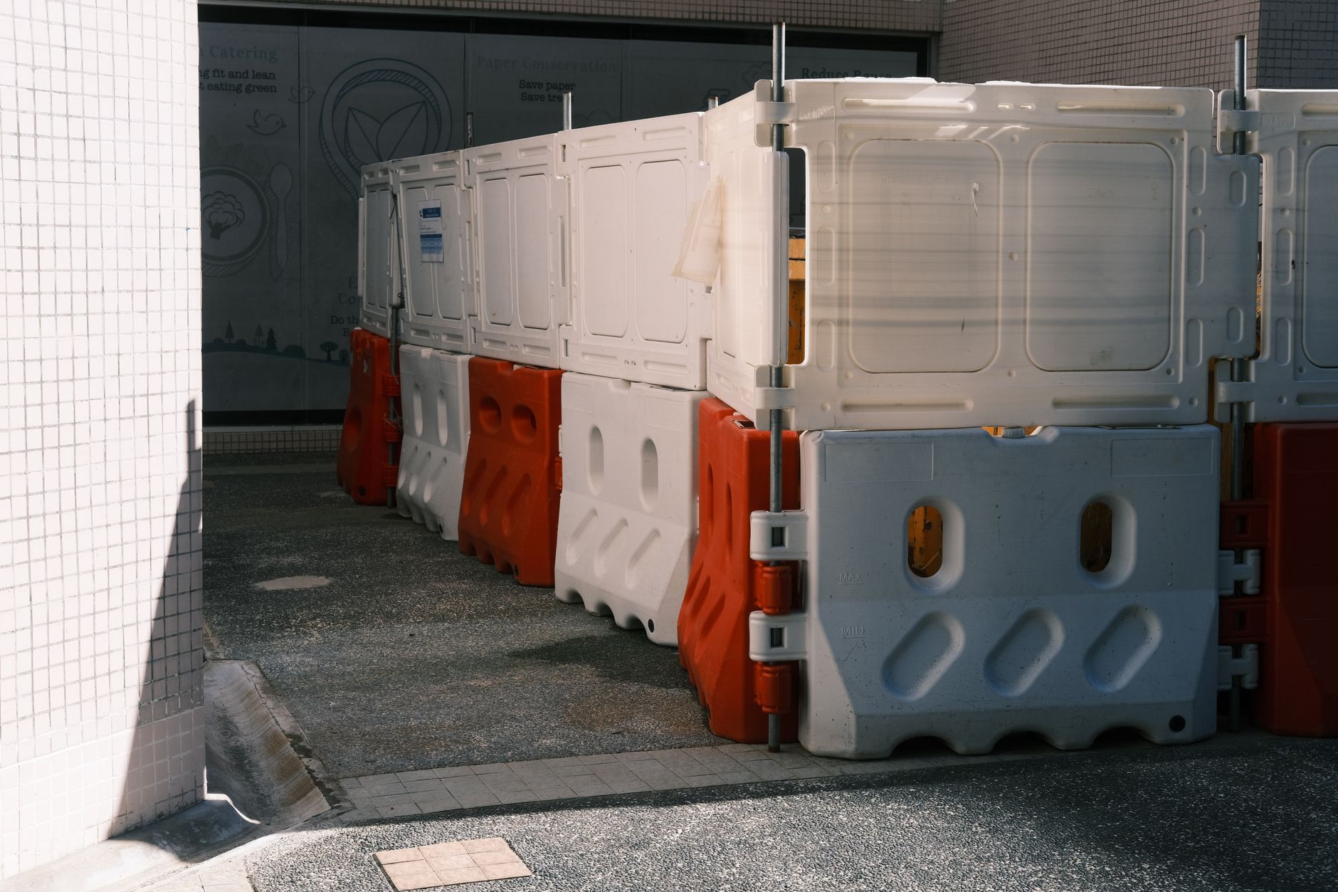 Temporary corridor barricades show why robot maps need offline fallback routes during renovation outages.