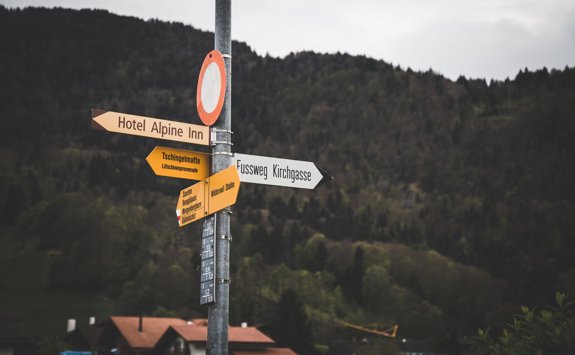 Clear directional signage at a hotel or resort, reinforcing the article's point that routes must be legible for both guests and operations teams.