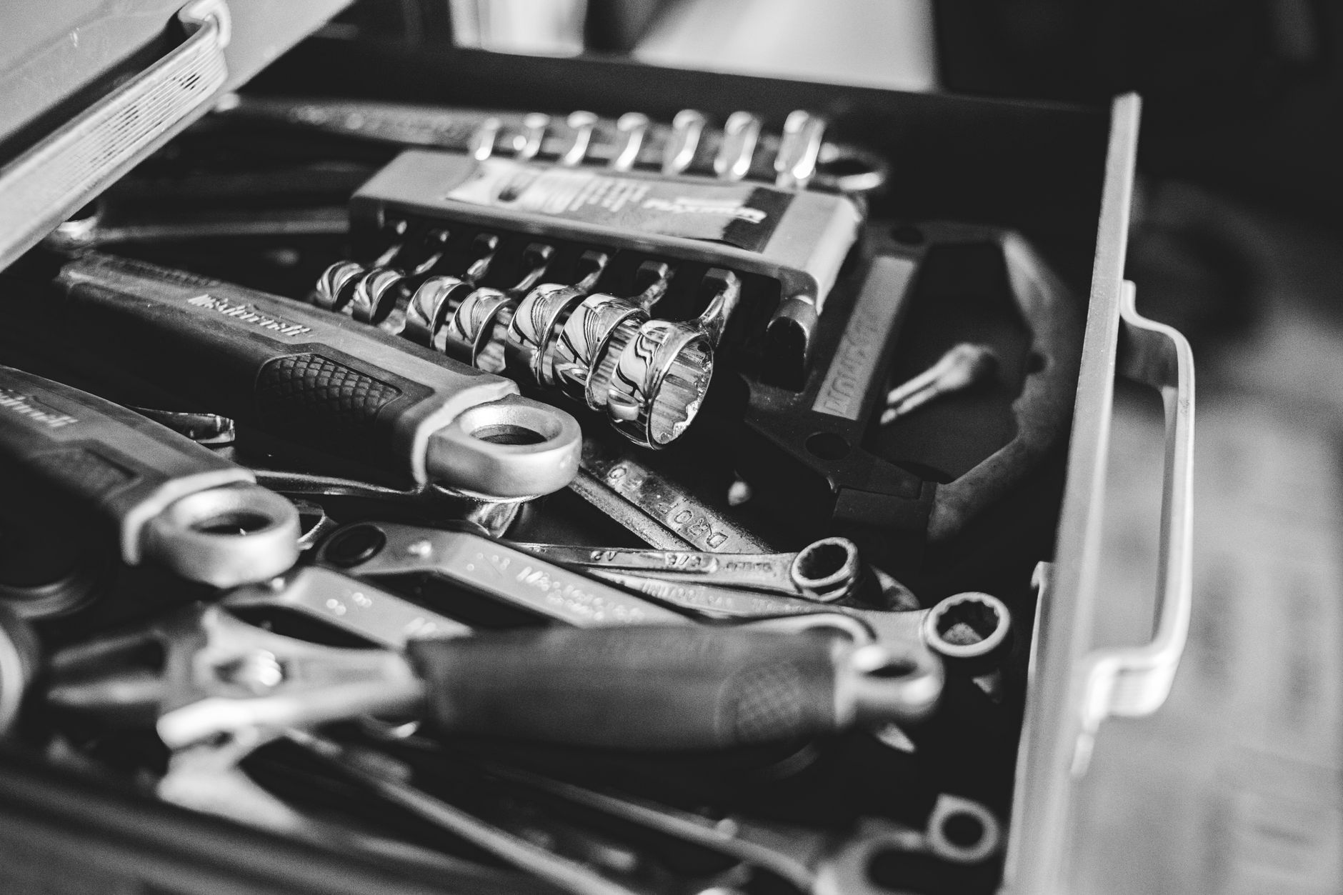 A maintenance clipboard with work orders, representing service level records bidders must match in a rebid.