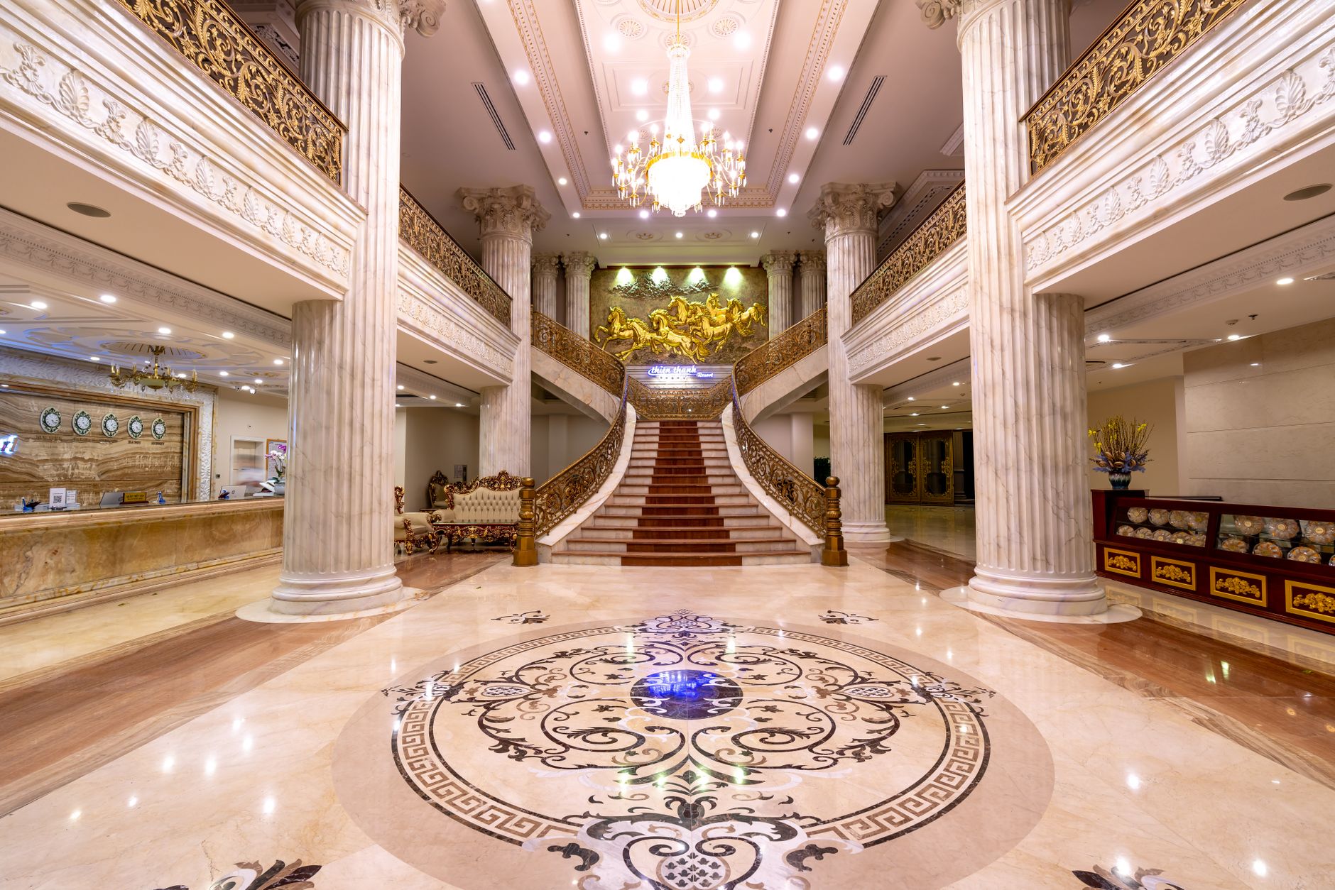 A polished stone lobby floor with natural reflections, representing the slip-risk and moisture-recovery concerns buyers should test in chapel-adjacent spaces.