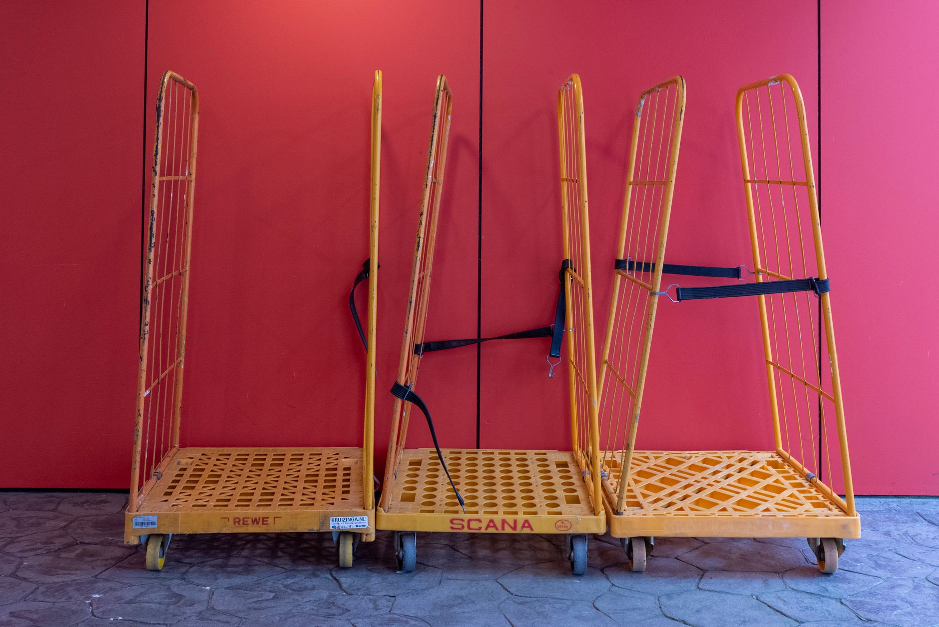 A loaded warehouse cart shows why teams must reproduce real payload weight and distribution during ramp testing.