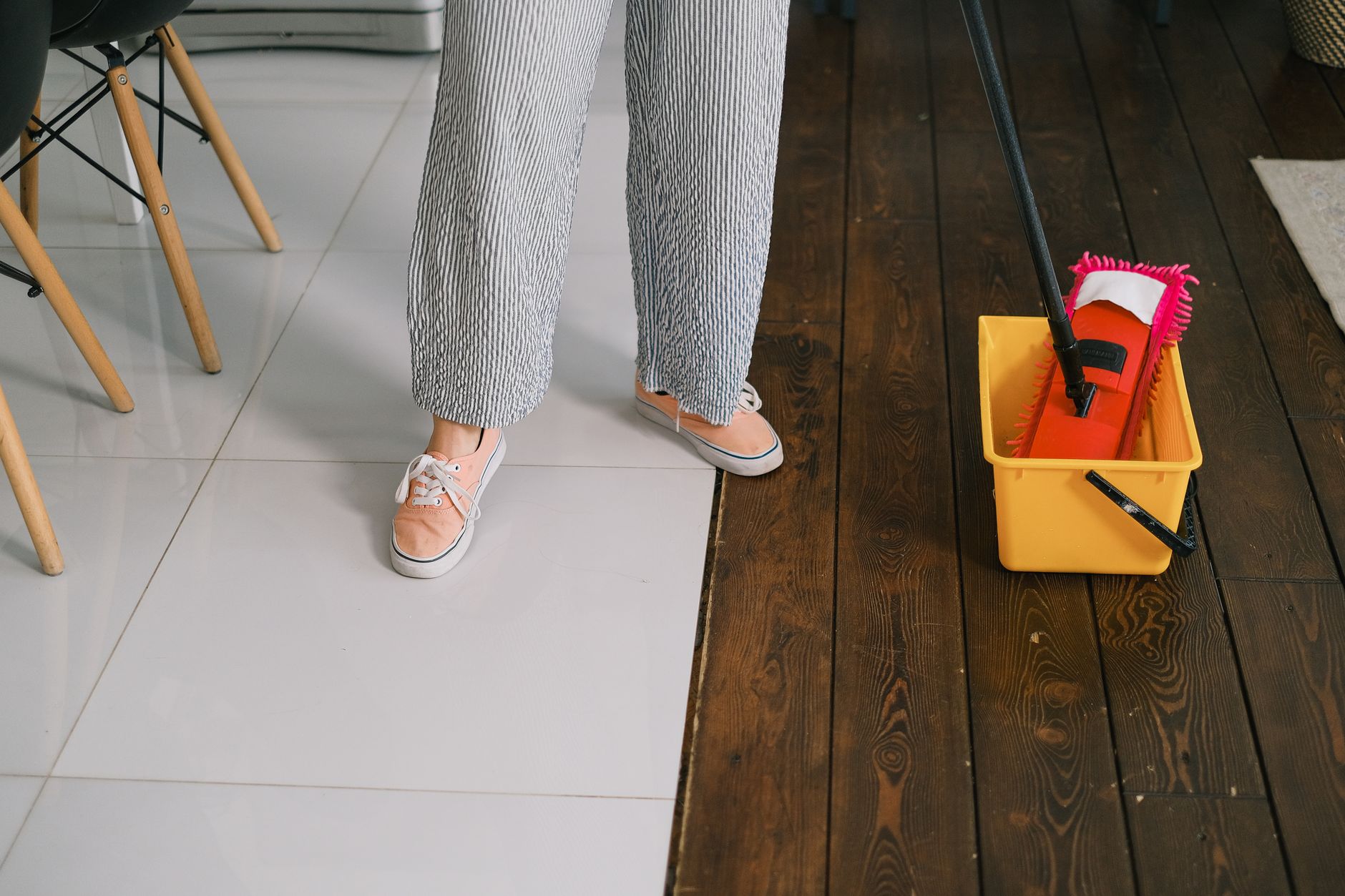 A floor-cleaning setup in a clinical hallway illustrates the infection-control discipline and cleaning workflow needed in a 24-hour vet hospital.